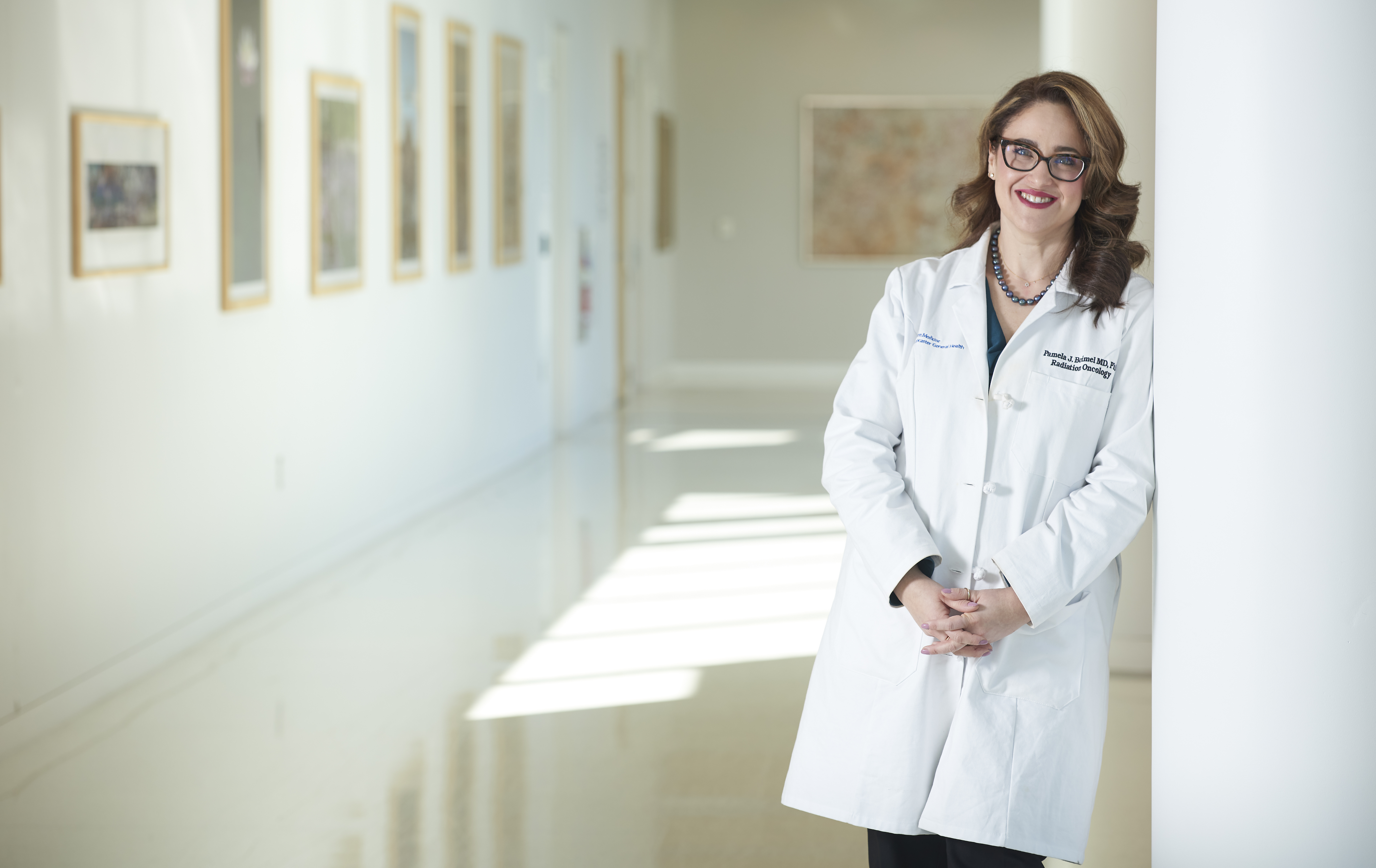 Pamela Boimel, MD, PhD standing and smiling