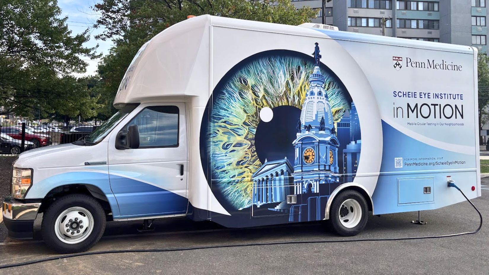 The exterior of the Scheie Eye Institute in MOTION van