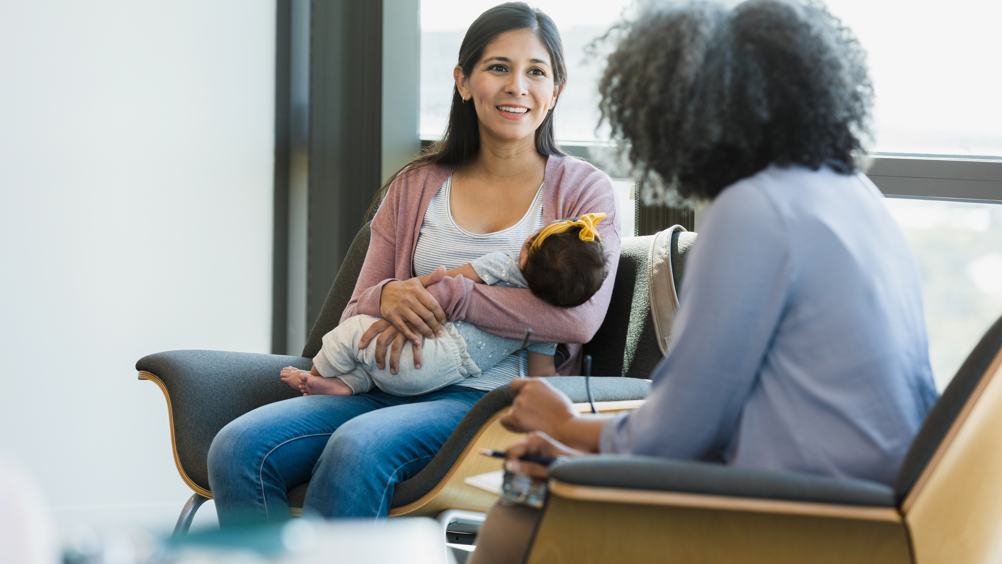 Therapist shares advice, new mother smiles