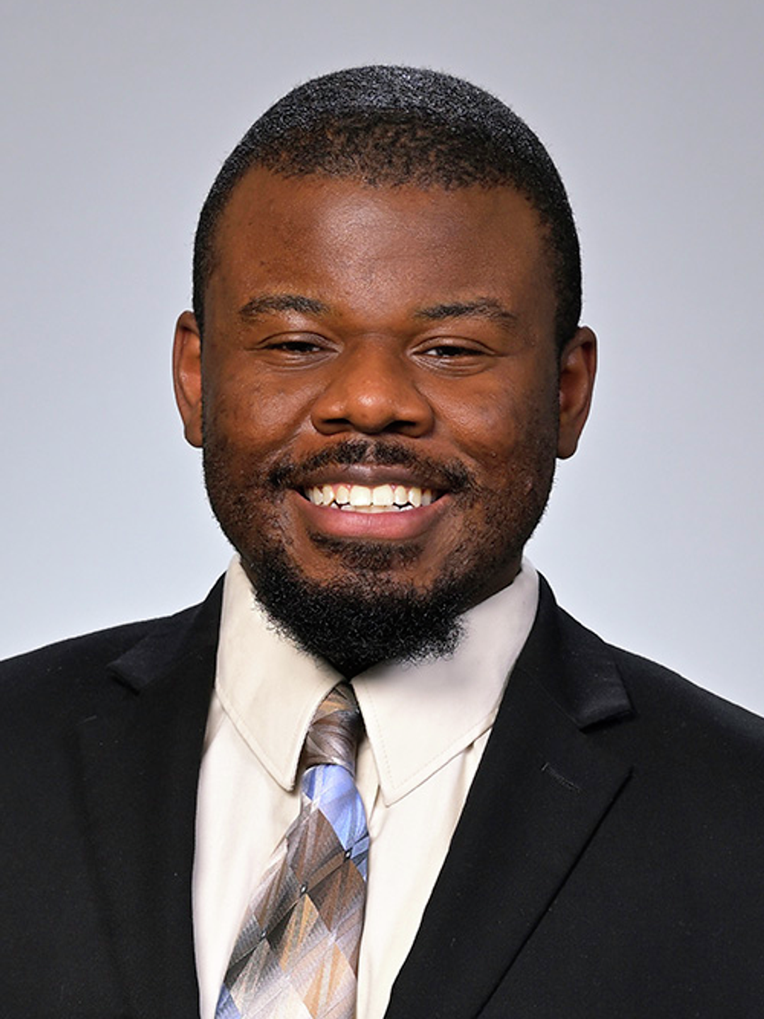 Headshot of Isaac Elysee, LCGC