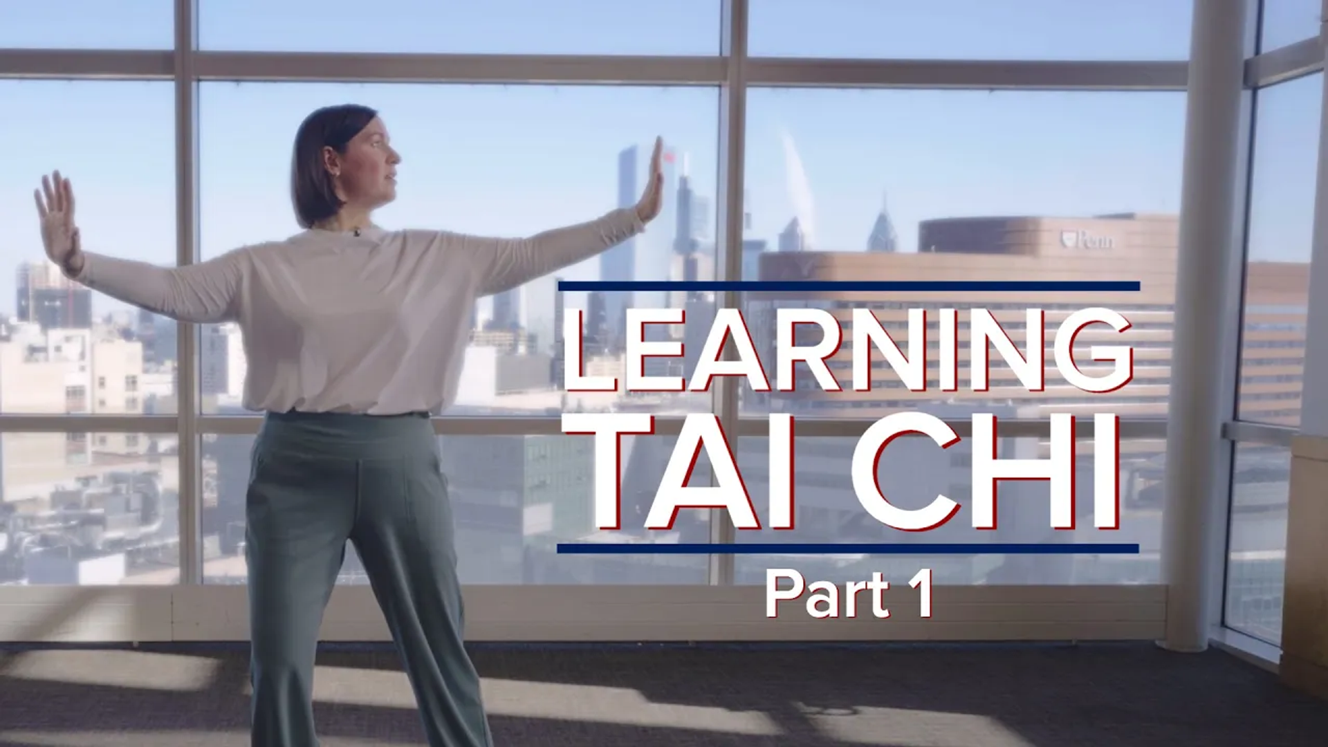 Youtube thumbnail of a Tai Chi instructor with arms in the air