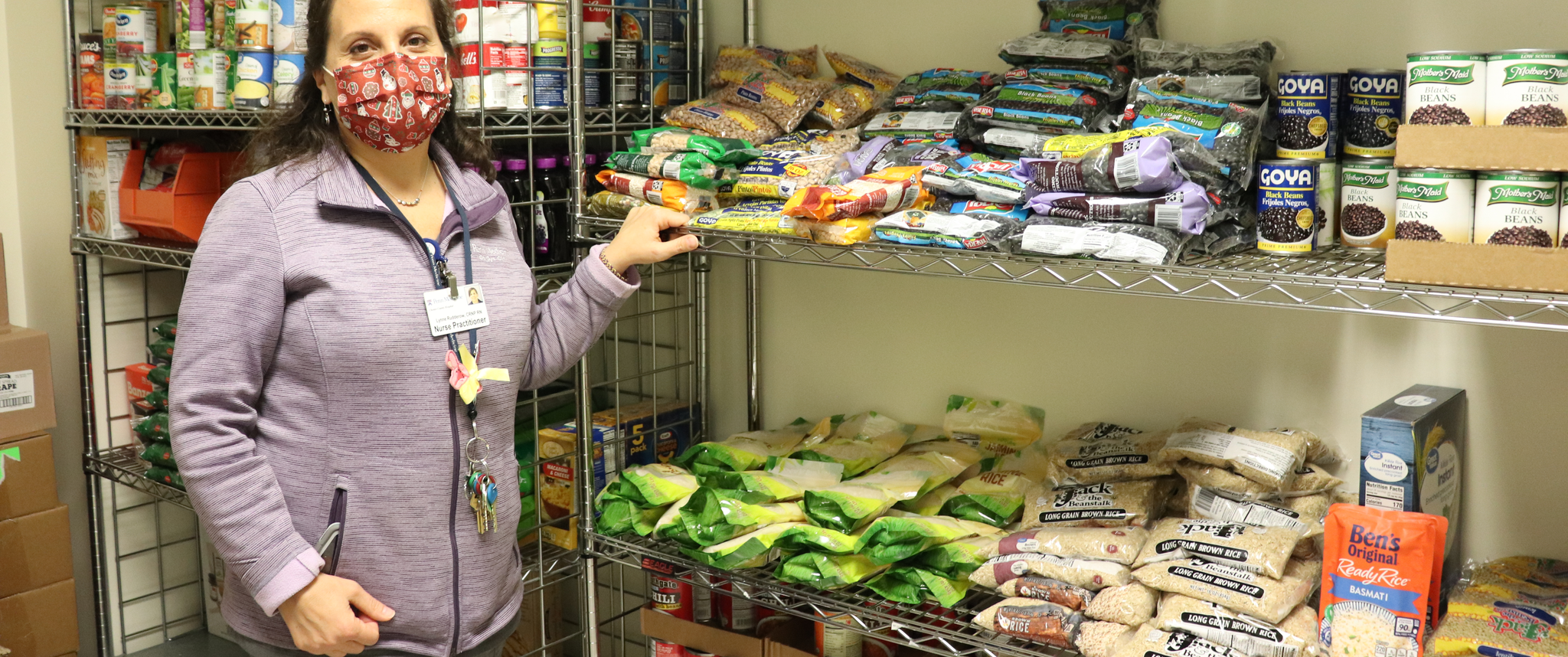 Nurse Practitioner Lynne Rudderow inside the food pantry at Chester County Hospital's OBGYN Clinic