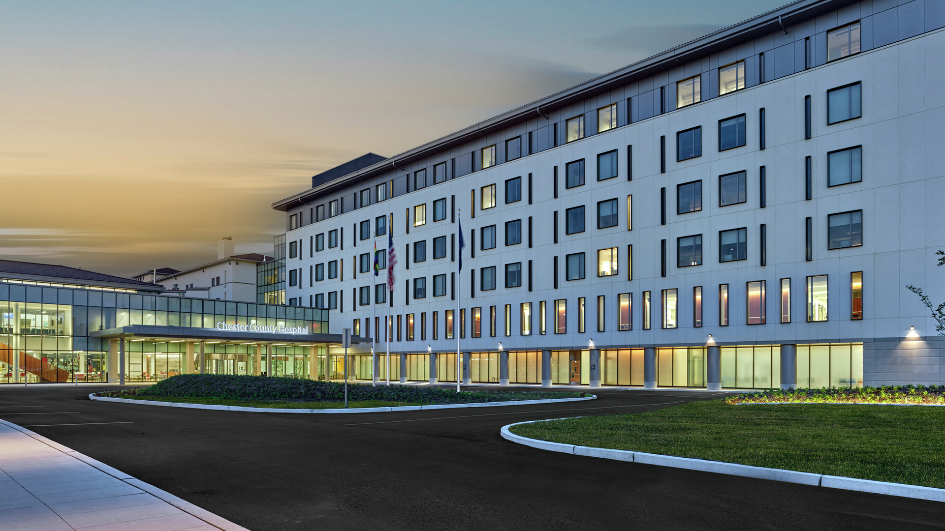 Chester County Hospital building at sunset