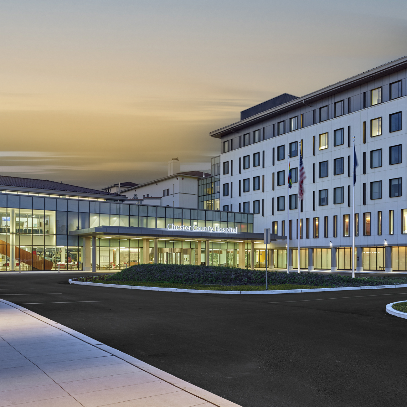 Chester County Hospital building at sunset