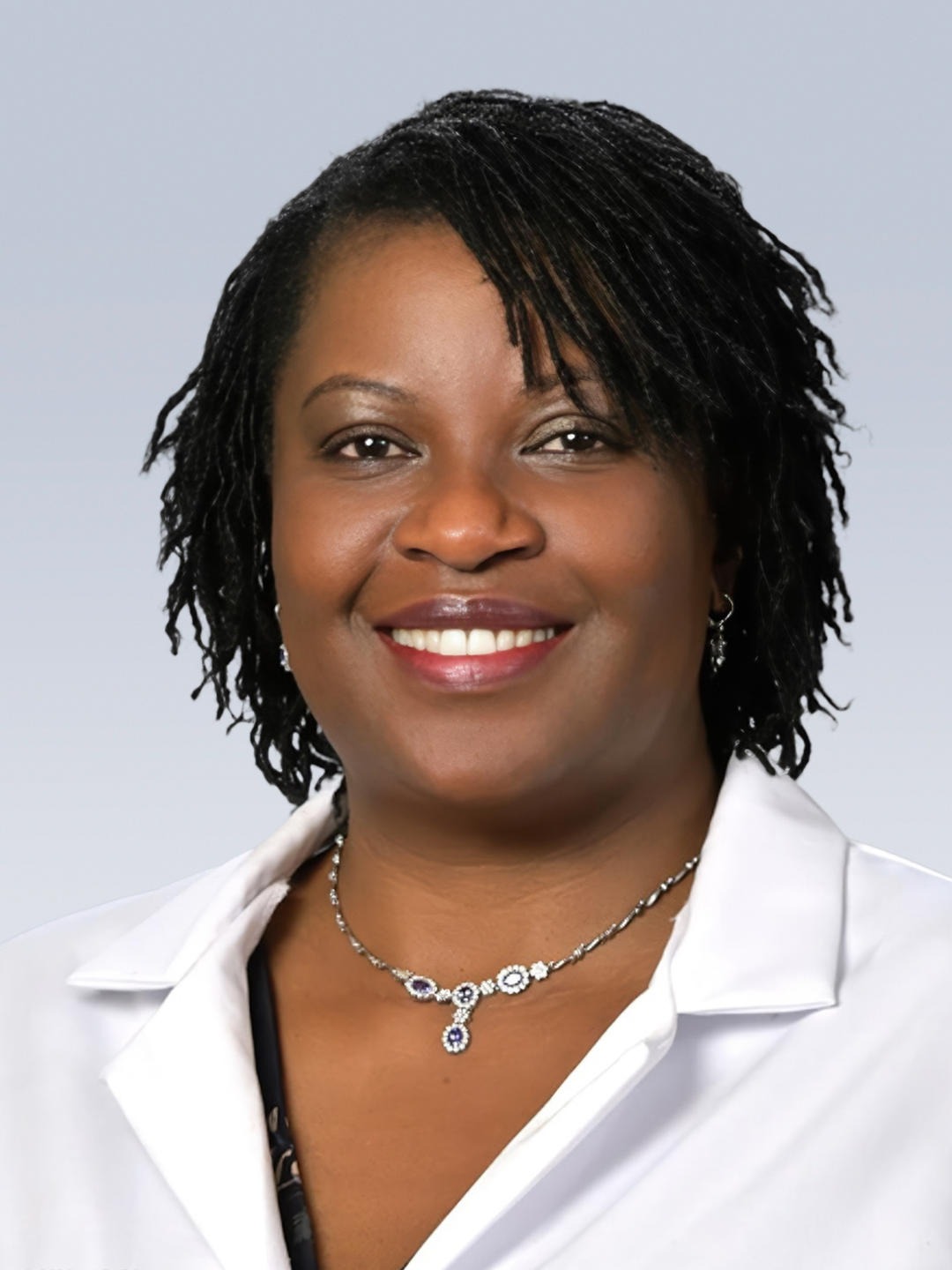 Headshot of Idith Ojo, DNP, AGACNP, PMHNP, CRNP