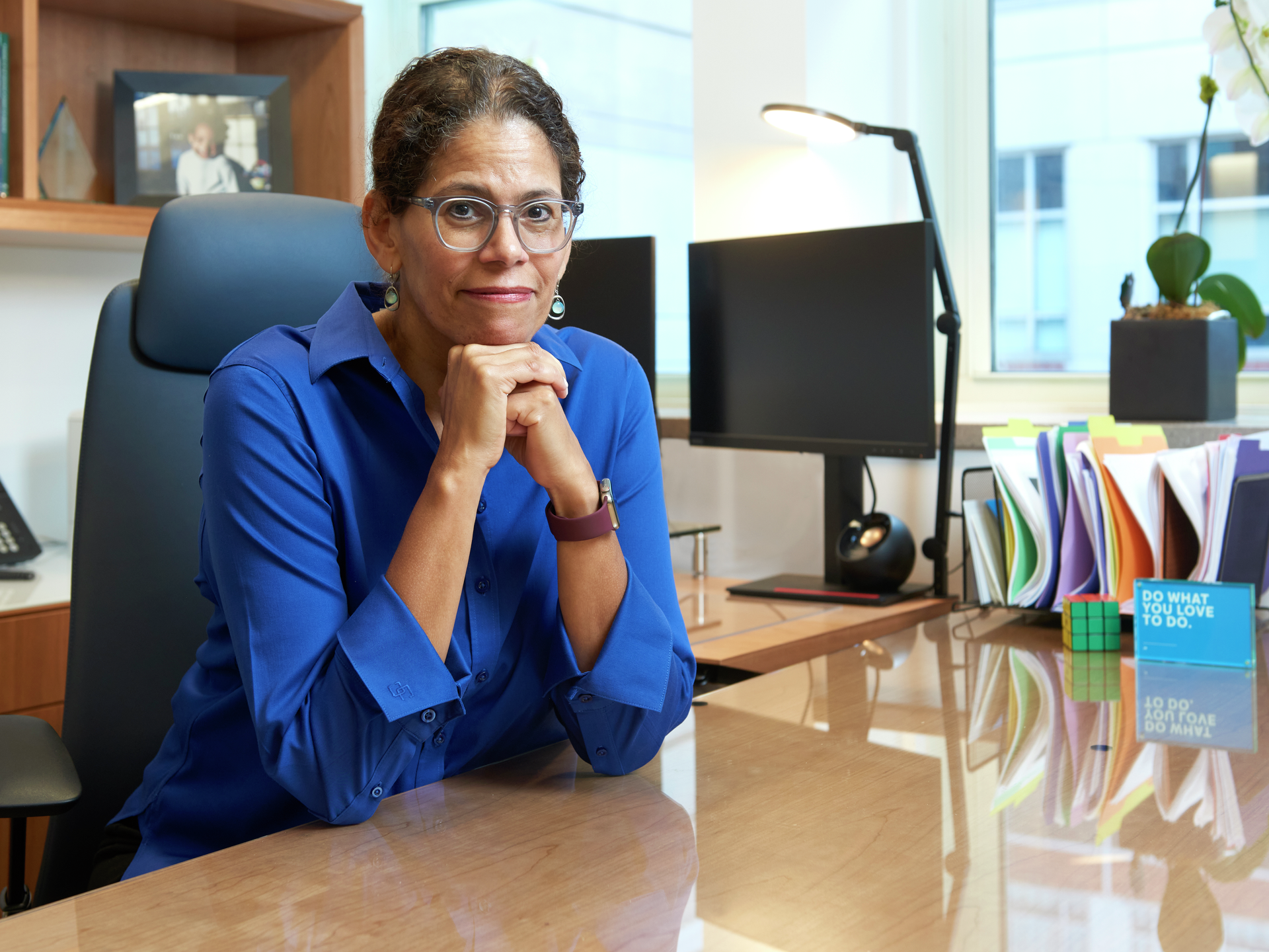 Elizabeth Howell, MD, MPP, seated at her desk
