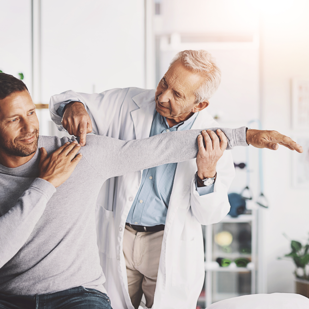 Senior doctor, man and patient with shoulder pain for physical therapy