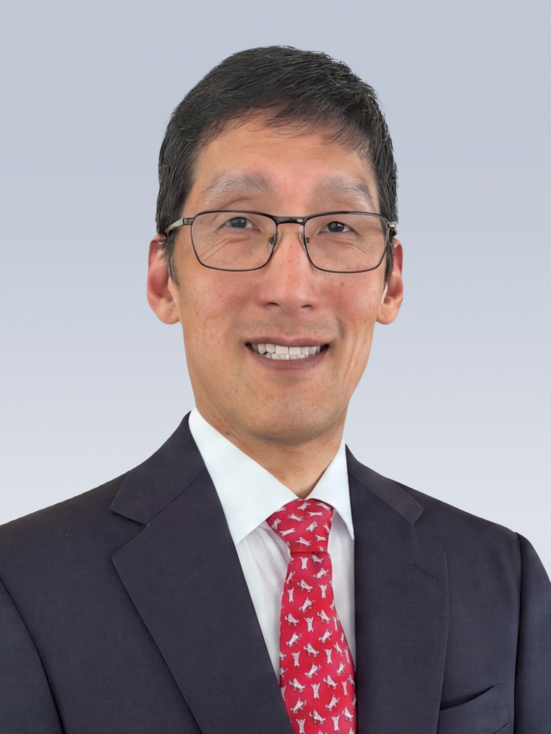 Headshot of John H. Woo, MD