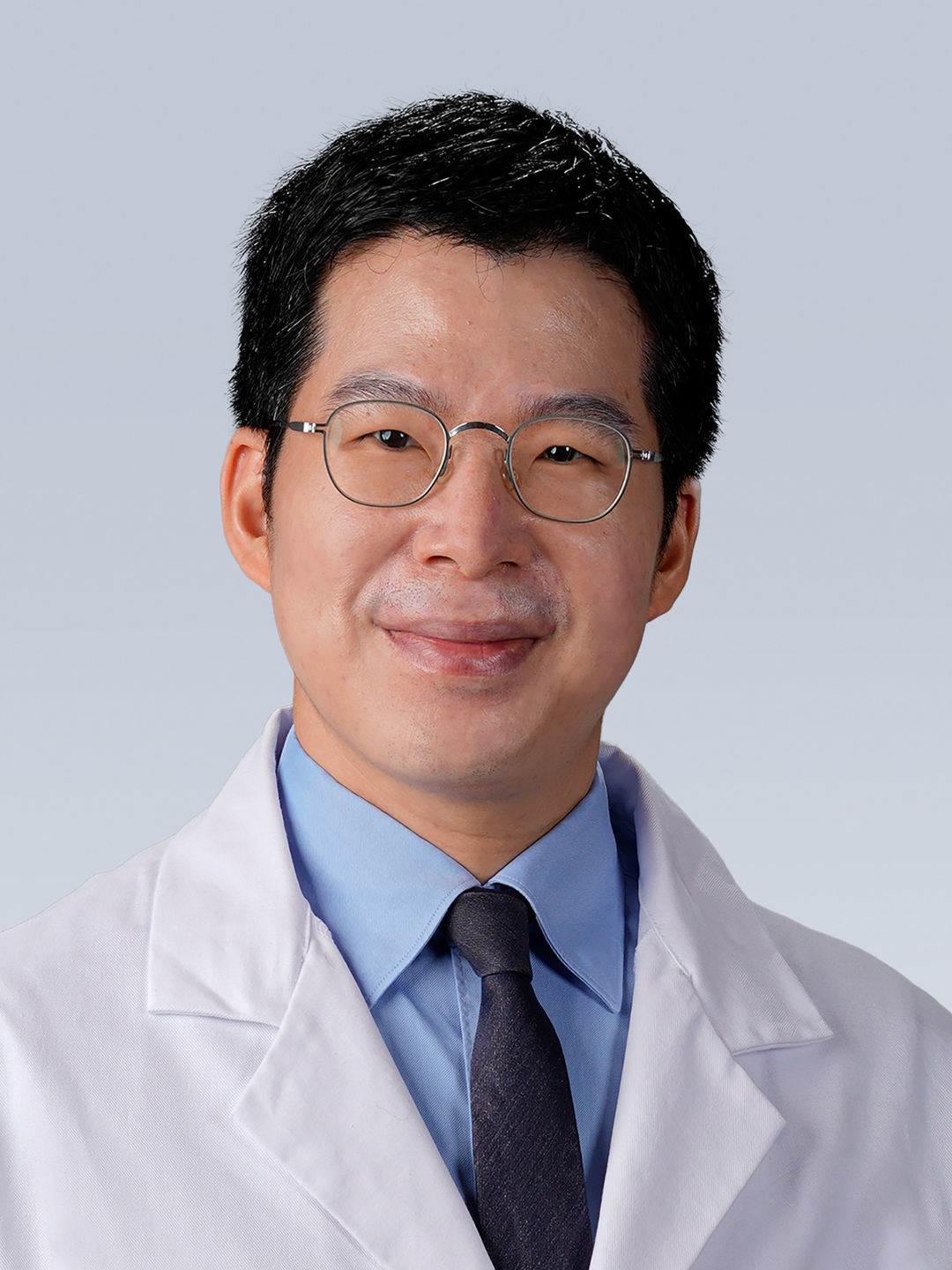 Headshot of Justin Roh, MD