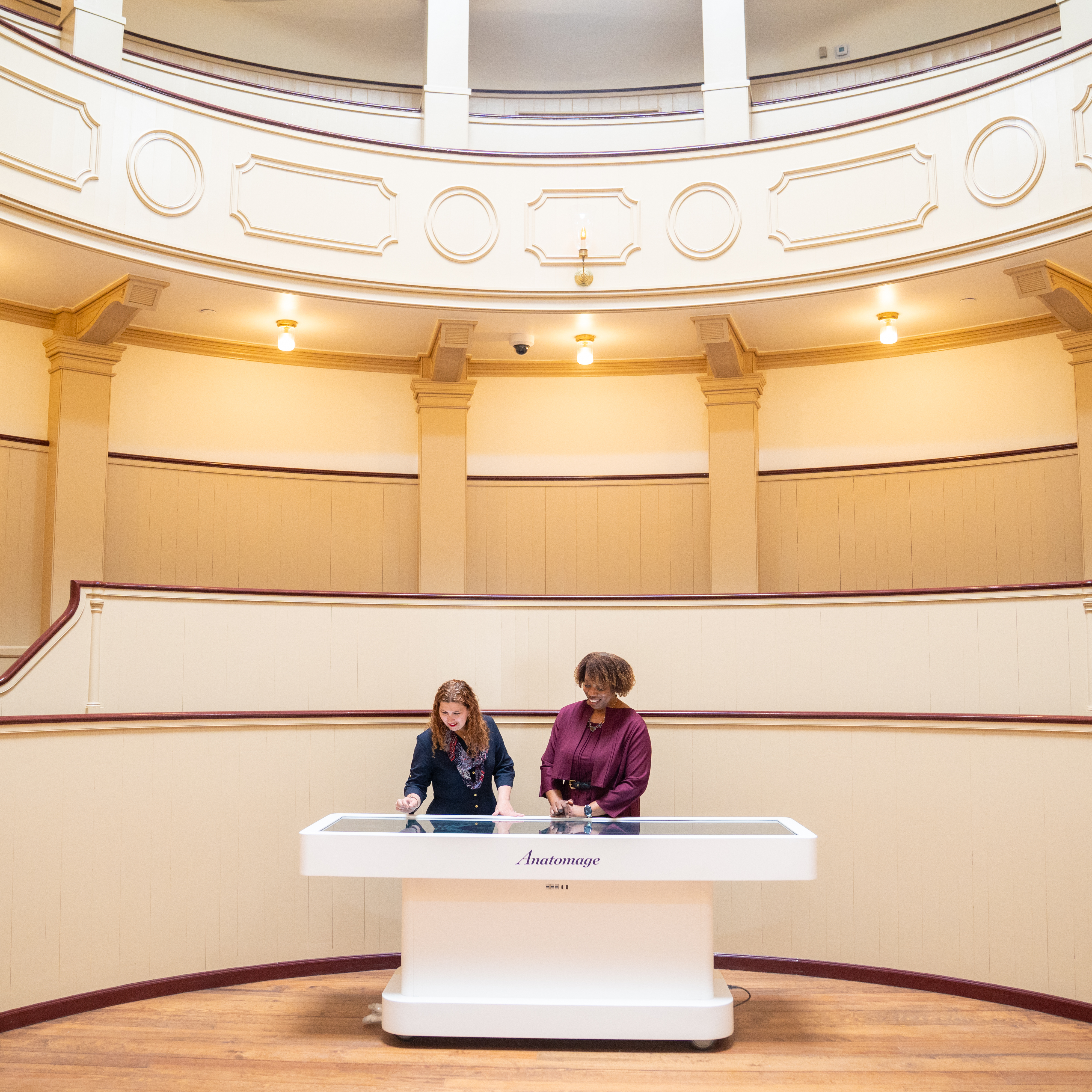 Stacey Peeples and Alicia Gresham at the anatomage table