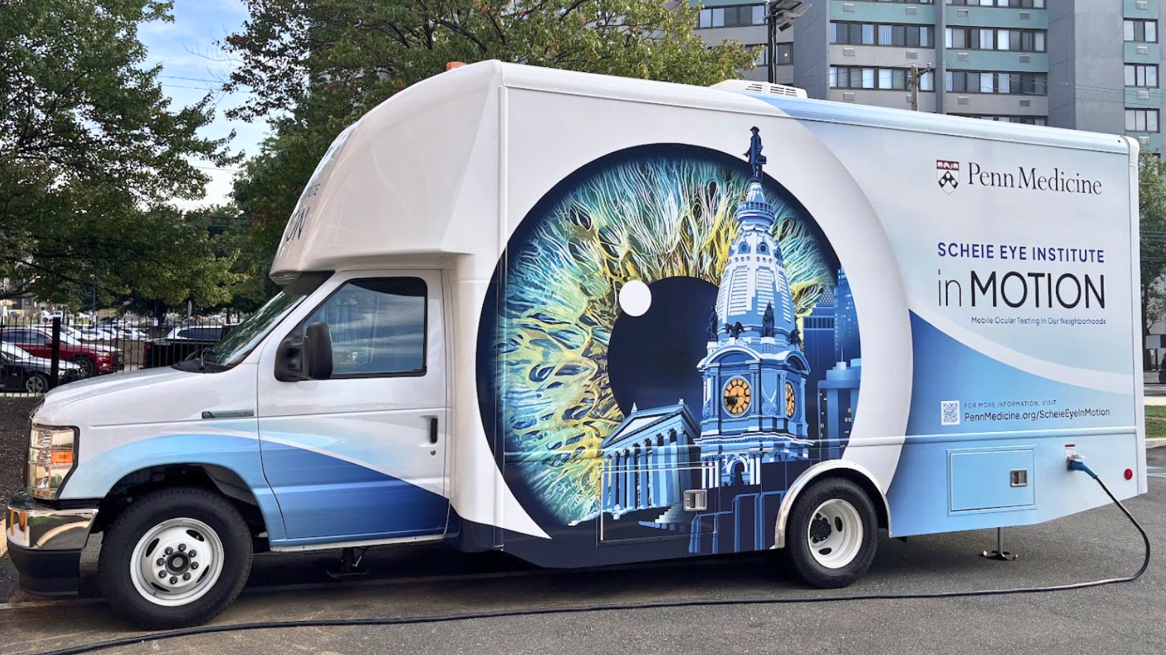 The exterior of the Scheie Eye Institute in MOTION van