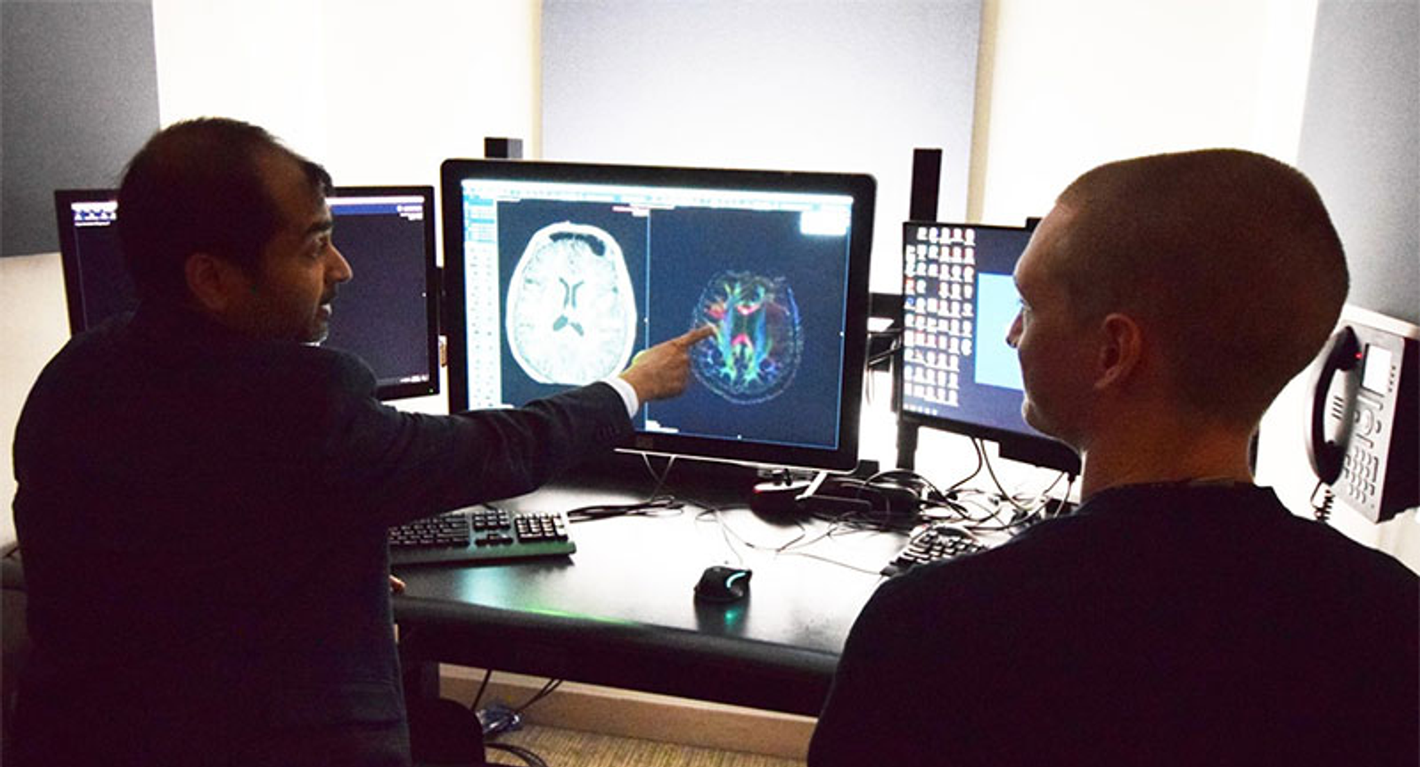 Penn Neuroradiology: Suyash Mohan in reading room with fellow