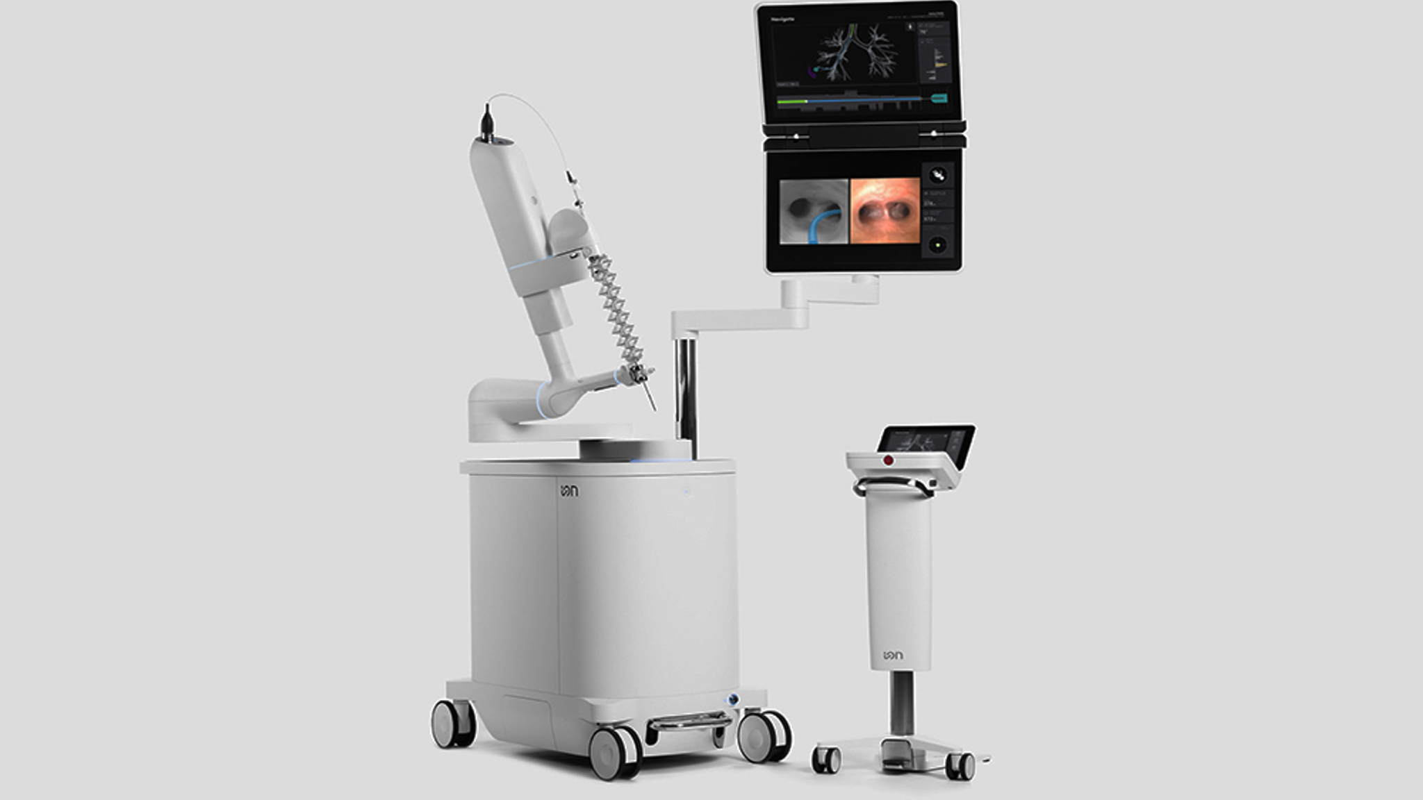The Ion bronchoscopy system console, catheter, and imaging screen are shown