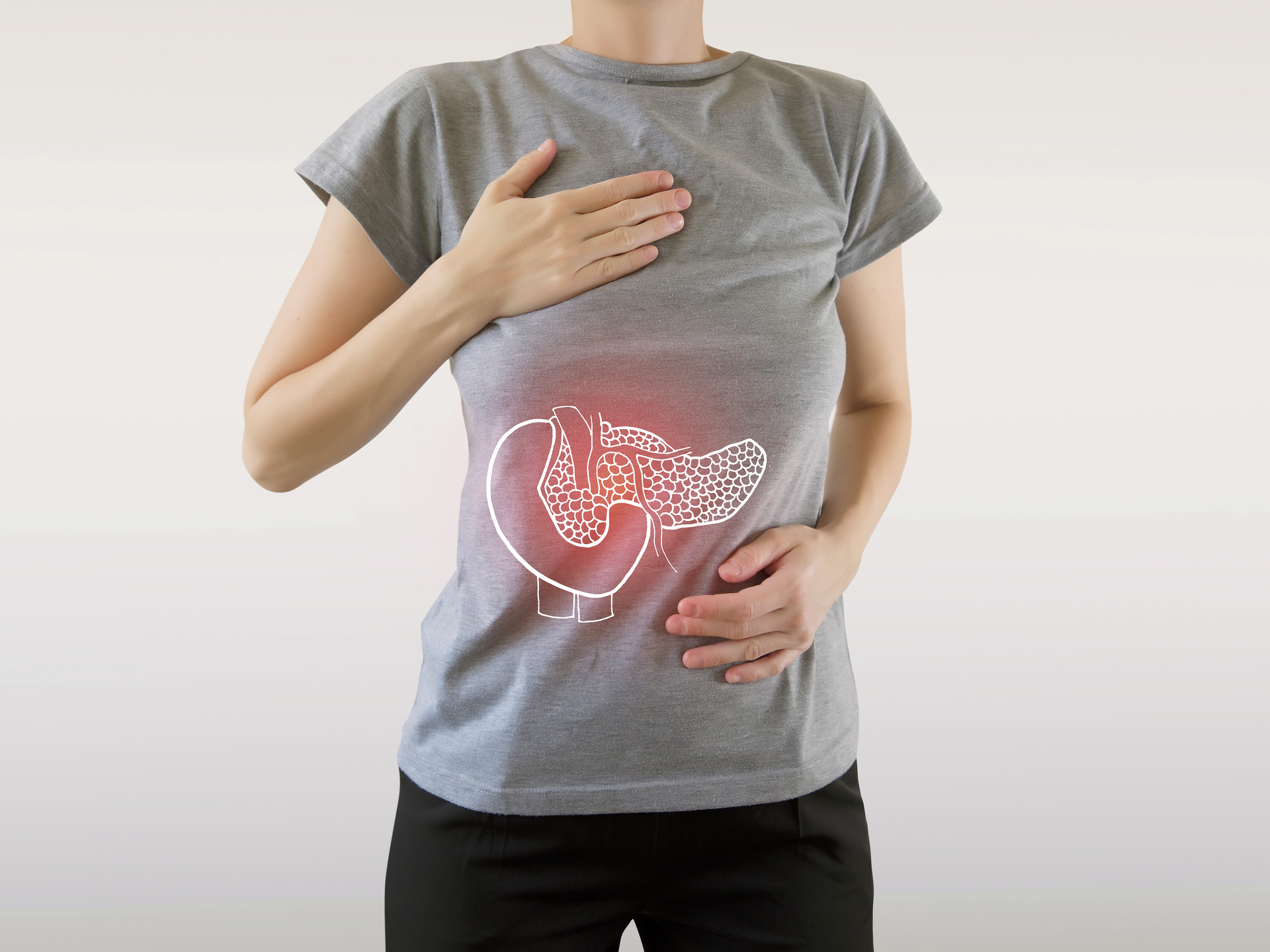 Digital composite of highlighted red pancreas of woman 