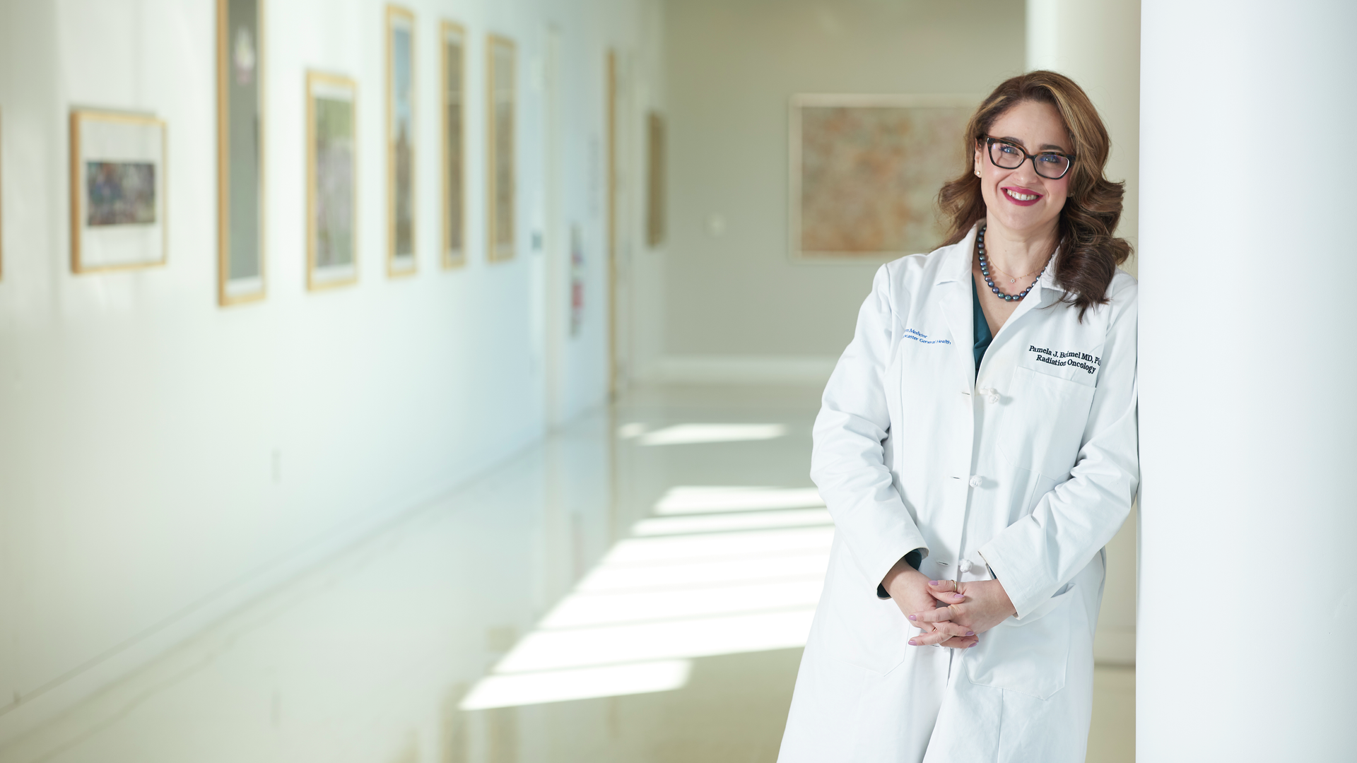 Pamela Boimel, MD, PhD standing and smiling