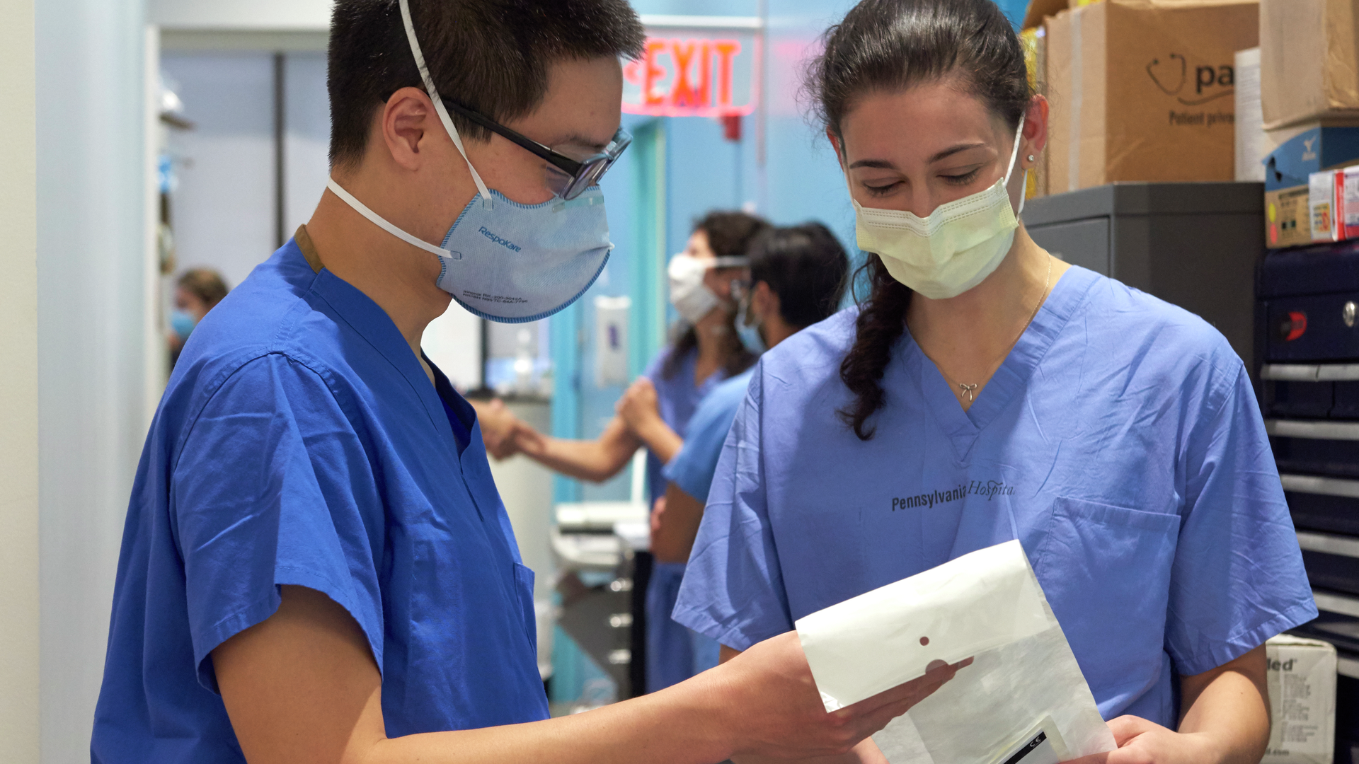 Medical students talk in the hallway