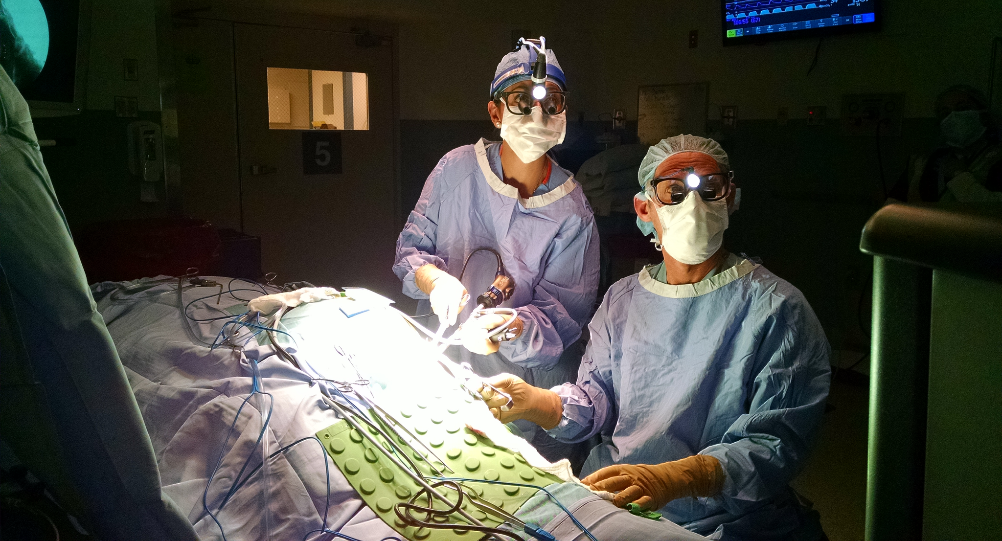 Dr. Zarina Ali and Dr. Eric Zager in surgery together