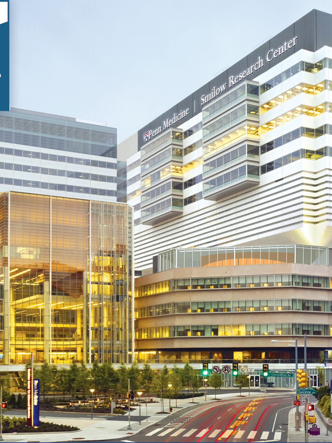 National Cancer Institute "Designated Comprehensive Cancer Center" badge on top of exterior shot of the Perelman Center for Advanced Medicine