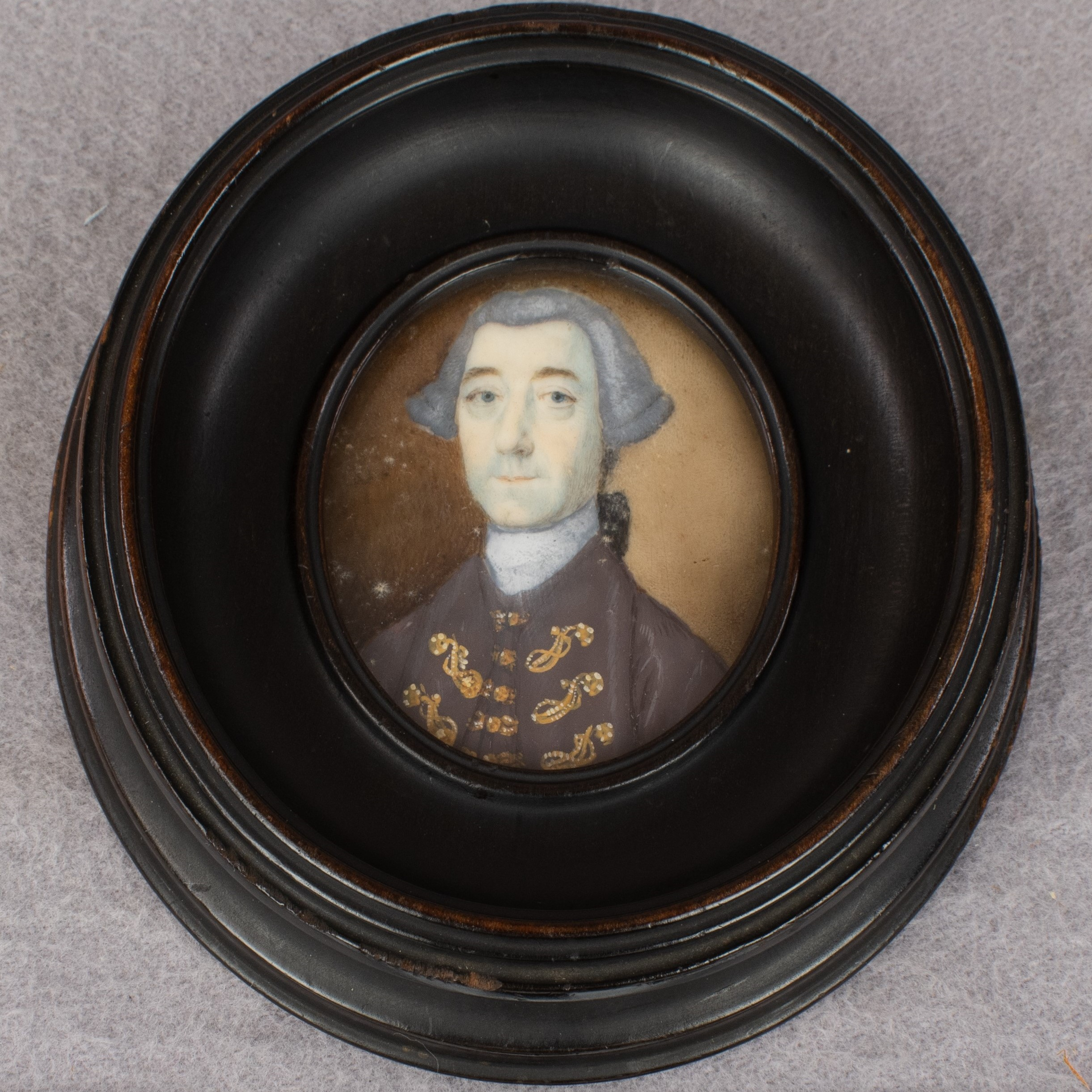 A framed portrait of Thomas Bond
