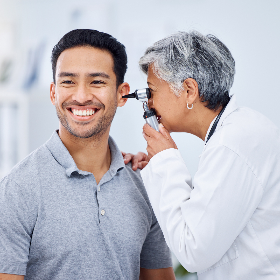 Man, smile or senior physician woman with otoscope test for medical consultation.