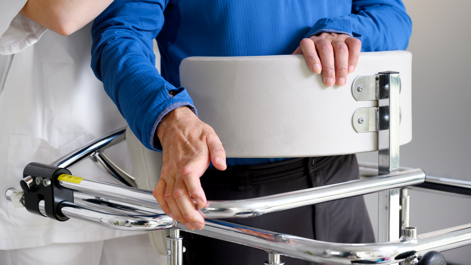 Physiotherapist assisting a patient with Amyotrophic Lateral Sclerosis. 