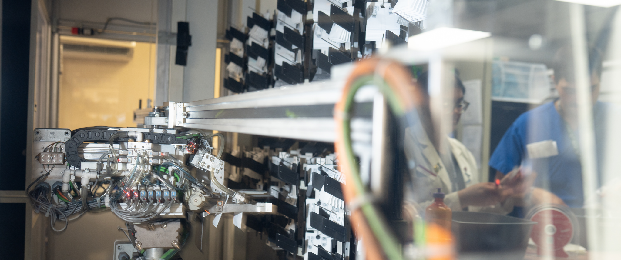 A robotic arm plucking baggies with single doses of medication destined for a patient’s bedside at Penn Presbyterian Medical Center