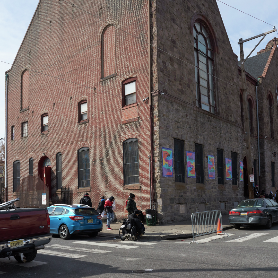A brick building, a former church, that is the headquarters of Prevention Point