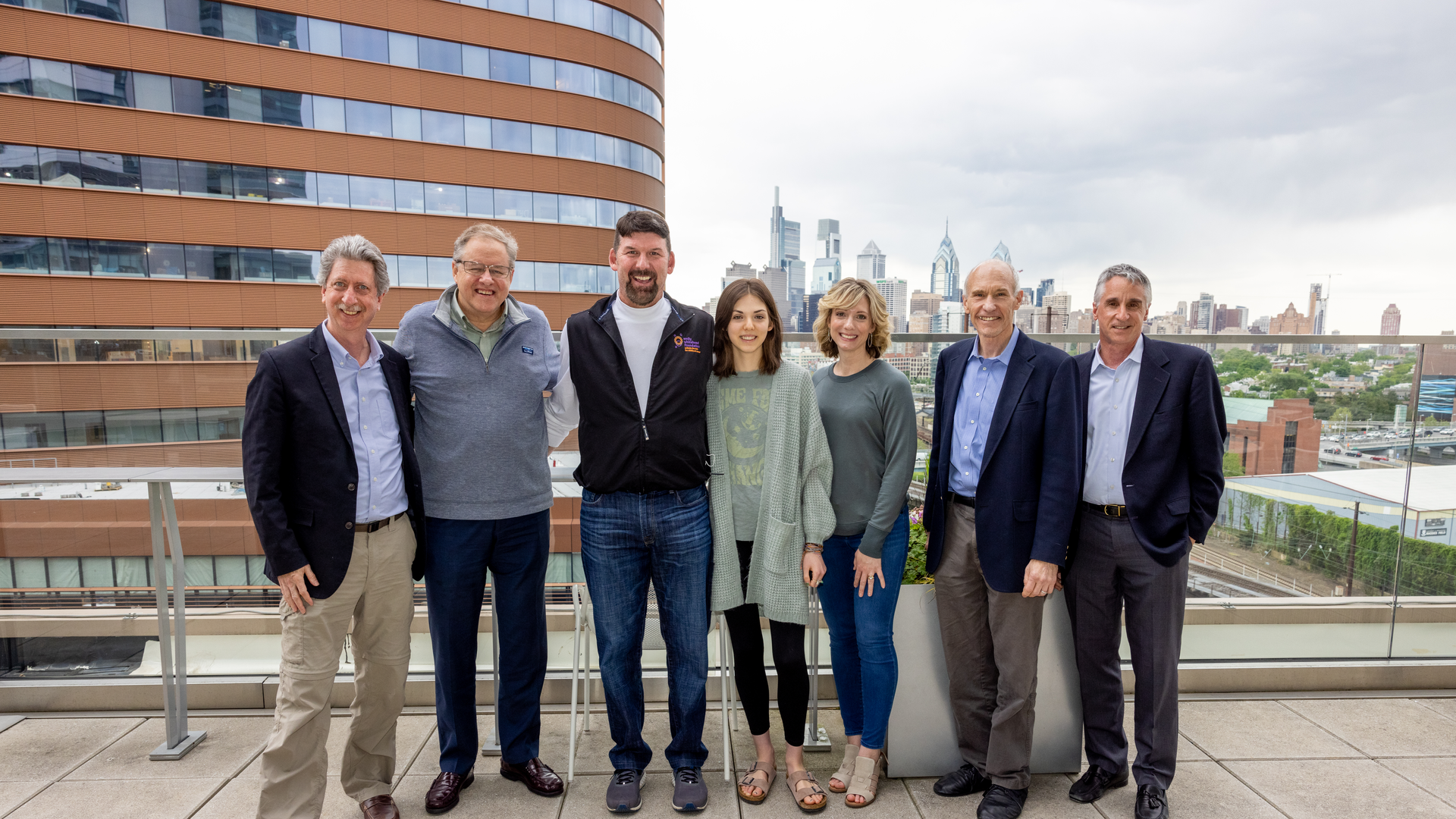 Group photo of CAR T researchers with the Whitehead family at Penn in 2022