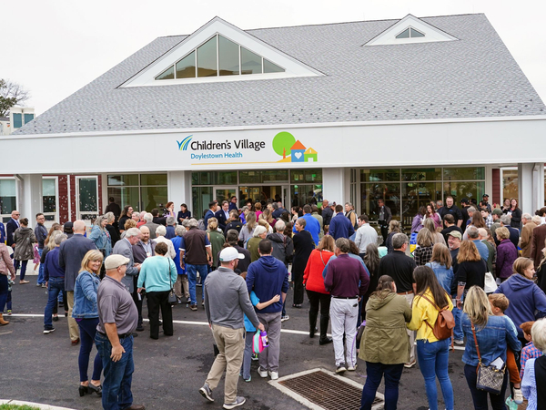 Community meeting outside Children's Village