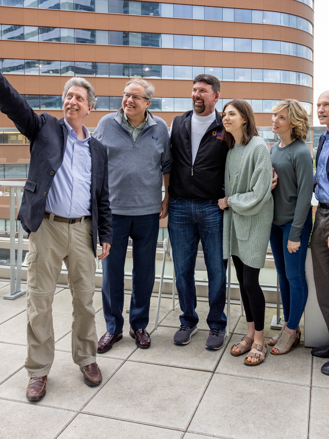 Bruce Levine takes a selfie in a group with Stephan Grupp, the Whitehead family, Carl June, and David Porter