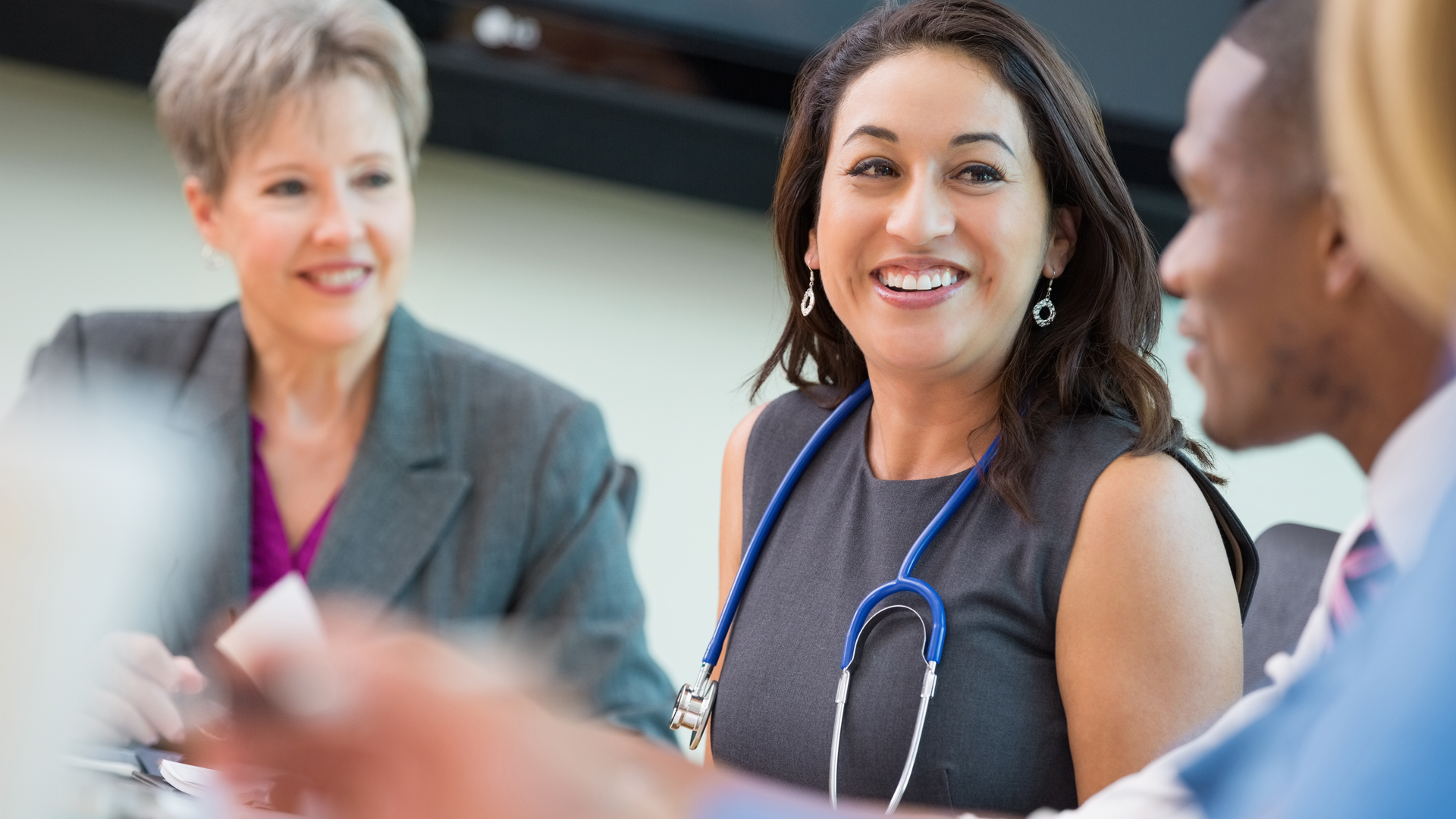 Doctors and hospital executives meeting to discuss healthcare policy