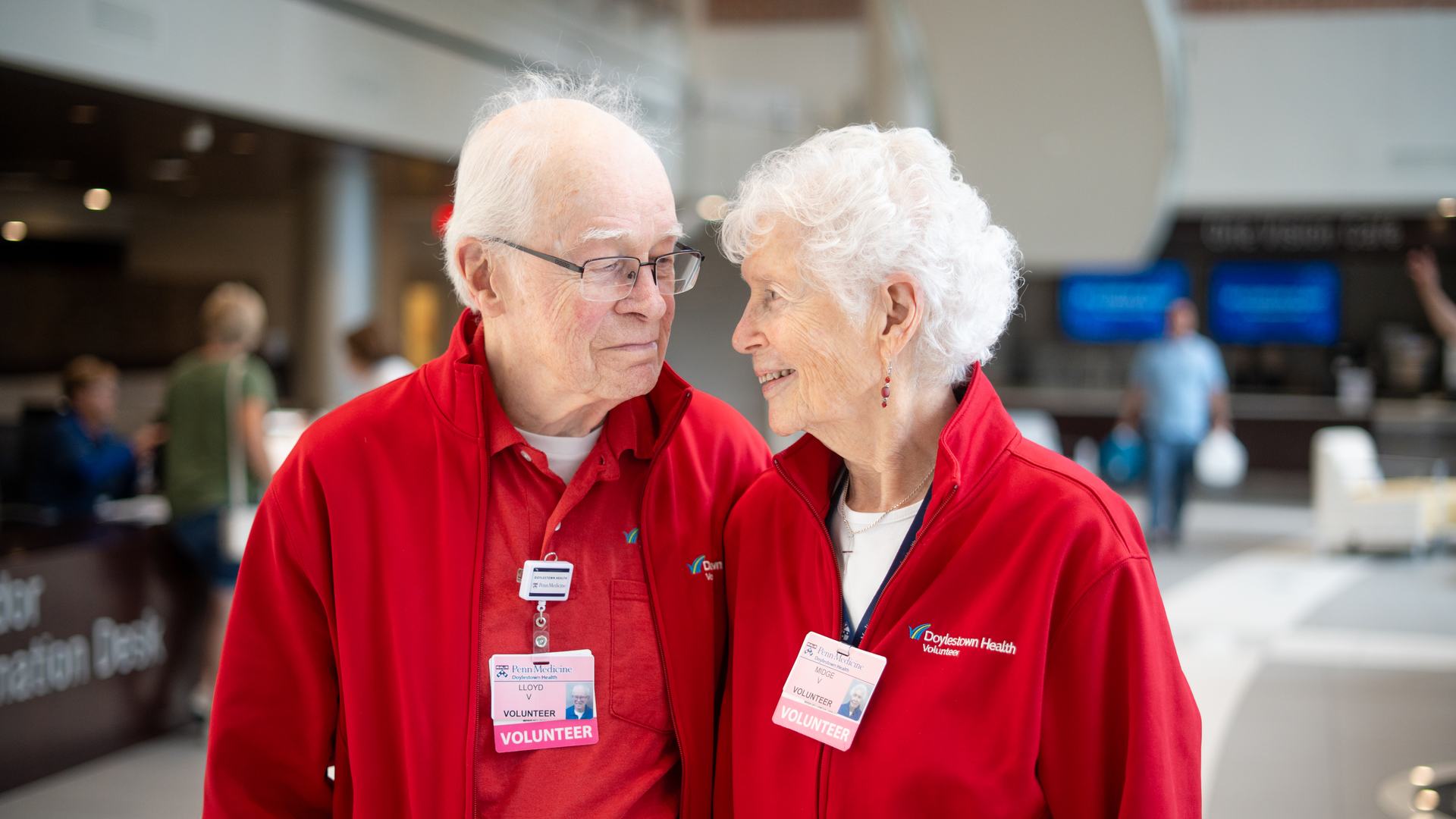 Lloyd and Midge Vansant embrace and look lovingly into each other's eyes