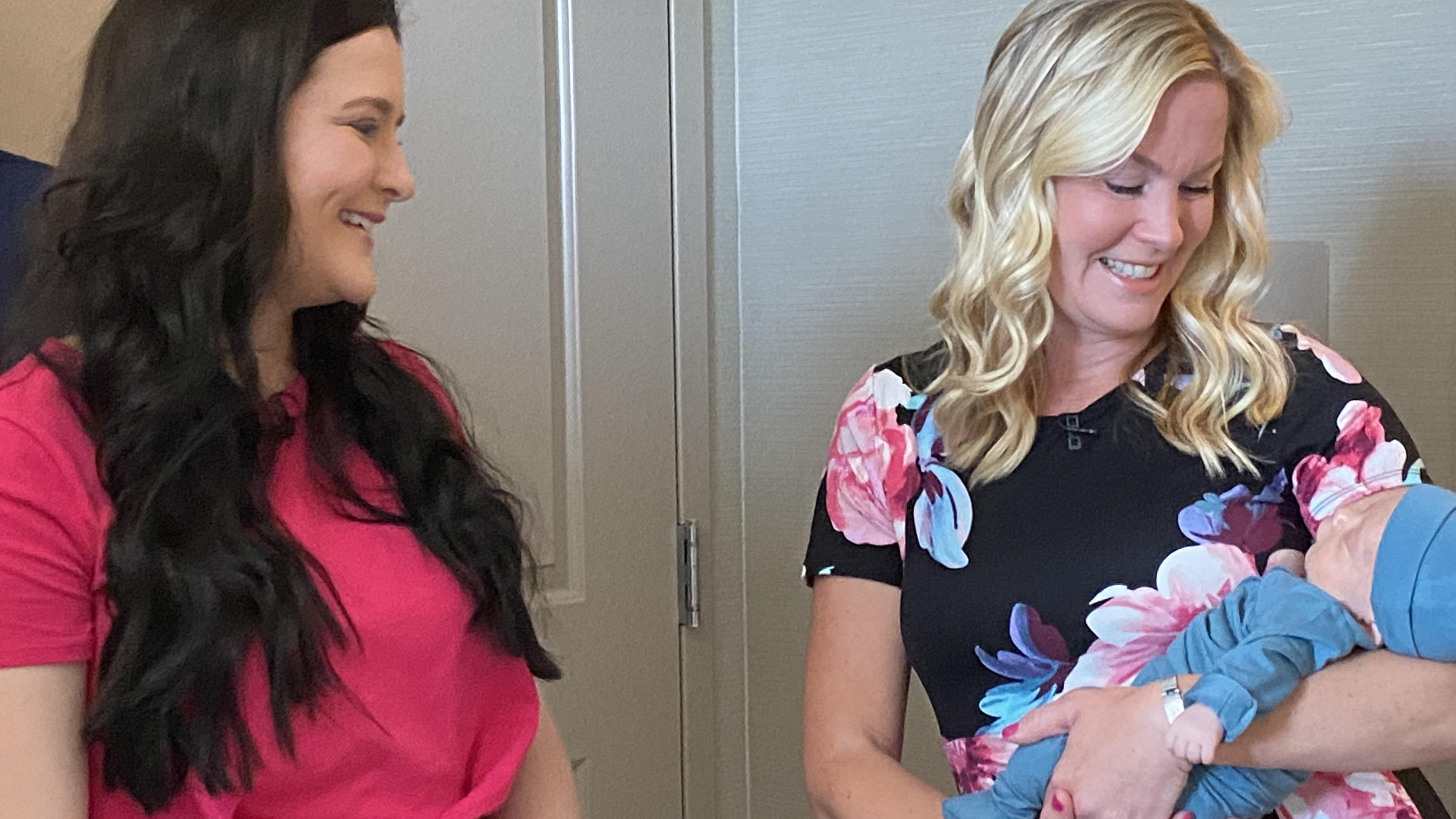 Chelsea Jovanovich smiles as Cheryl Urban meets baby Telden for the first time