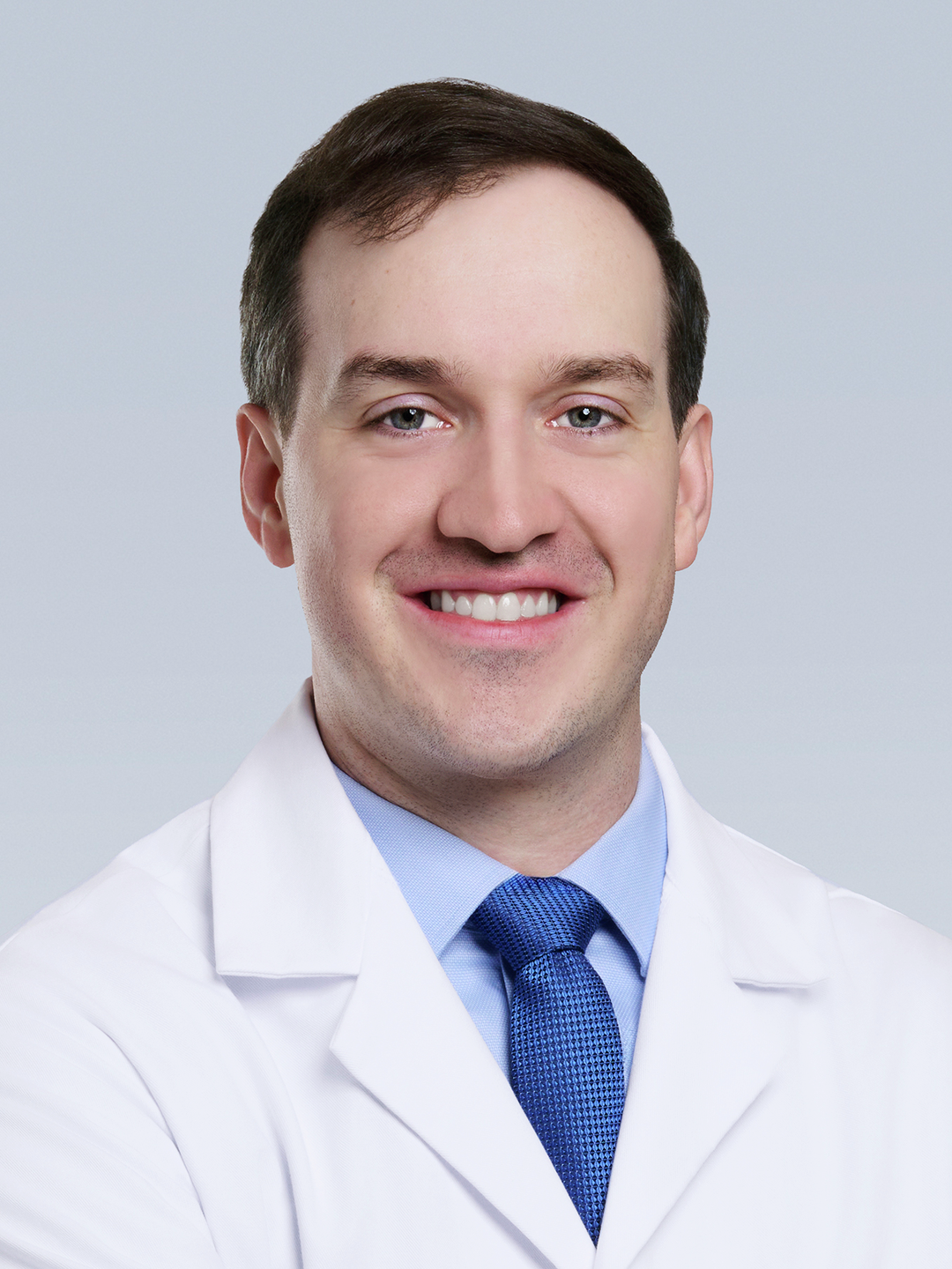 Headshot of Reid Michael Muenzen, MD