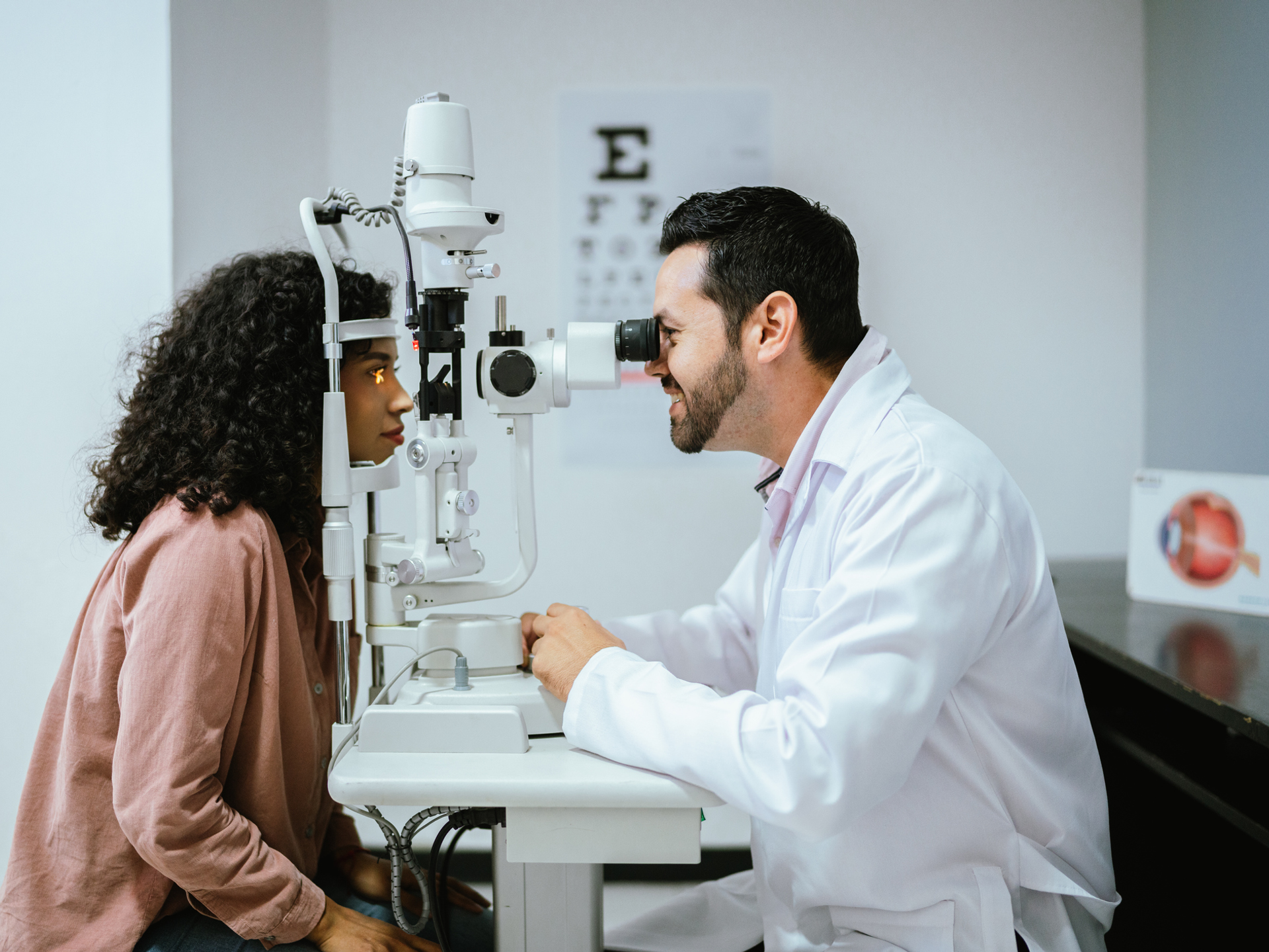 Young woman having an eye exam with an ophthalmologist.