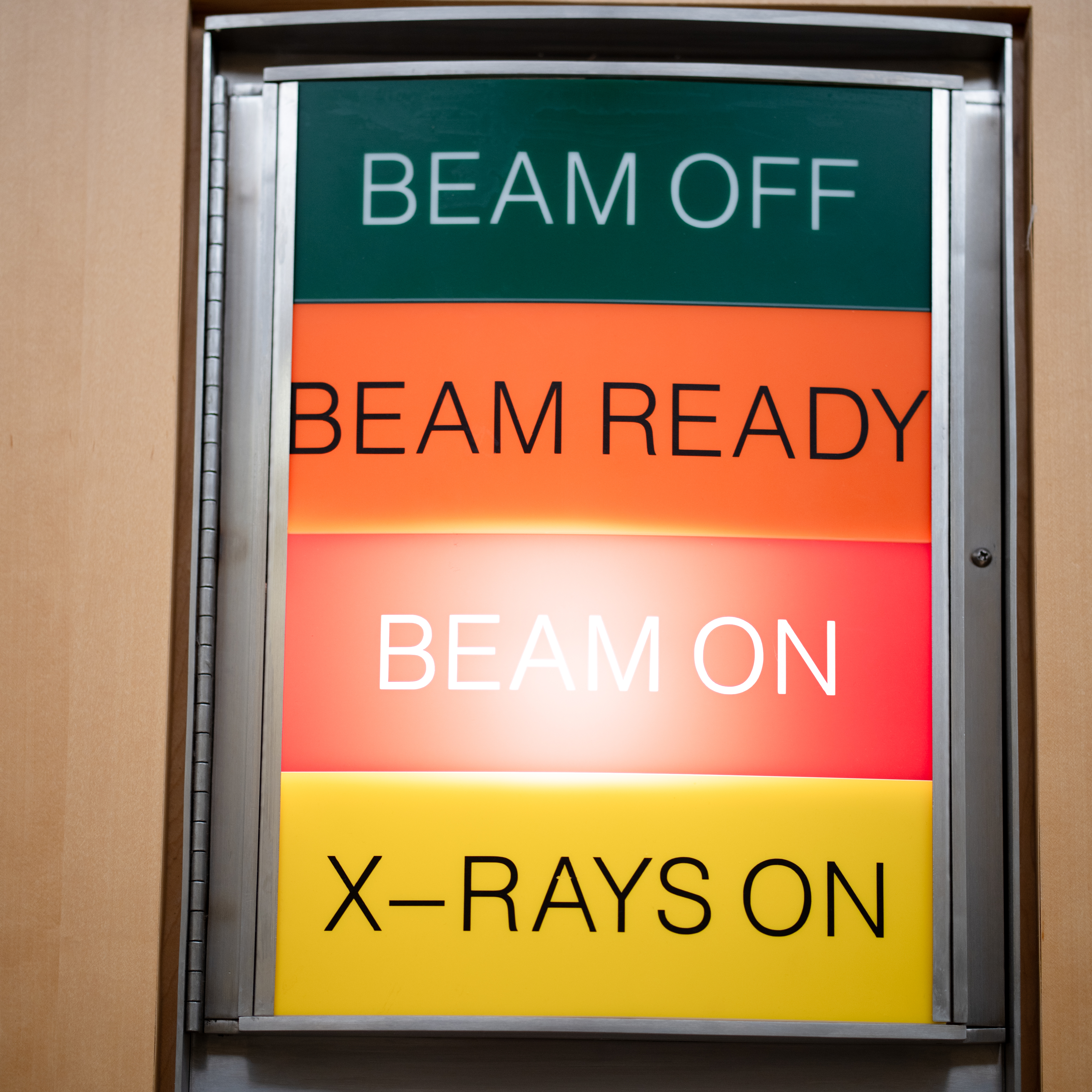A sign indicating the proton beam is active