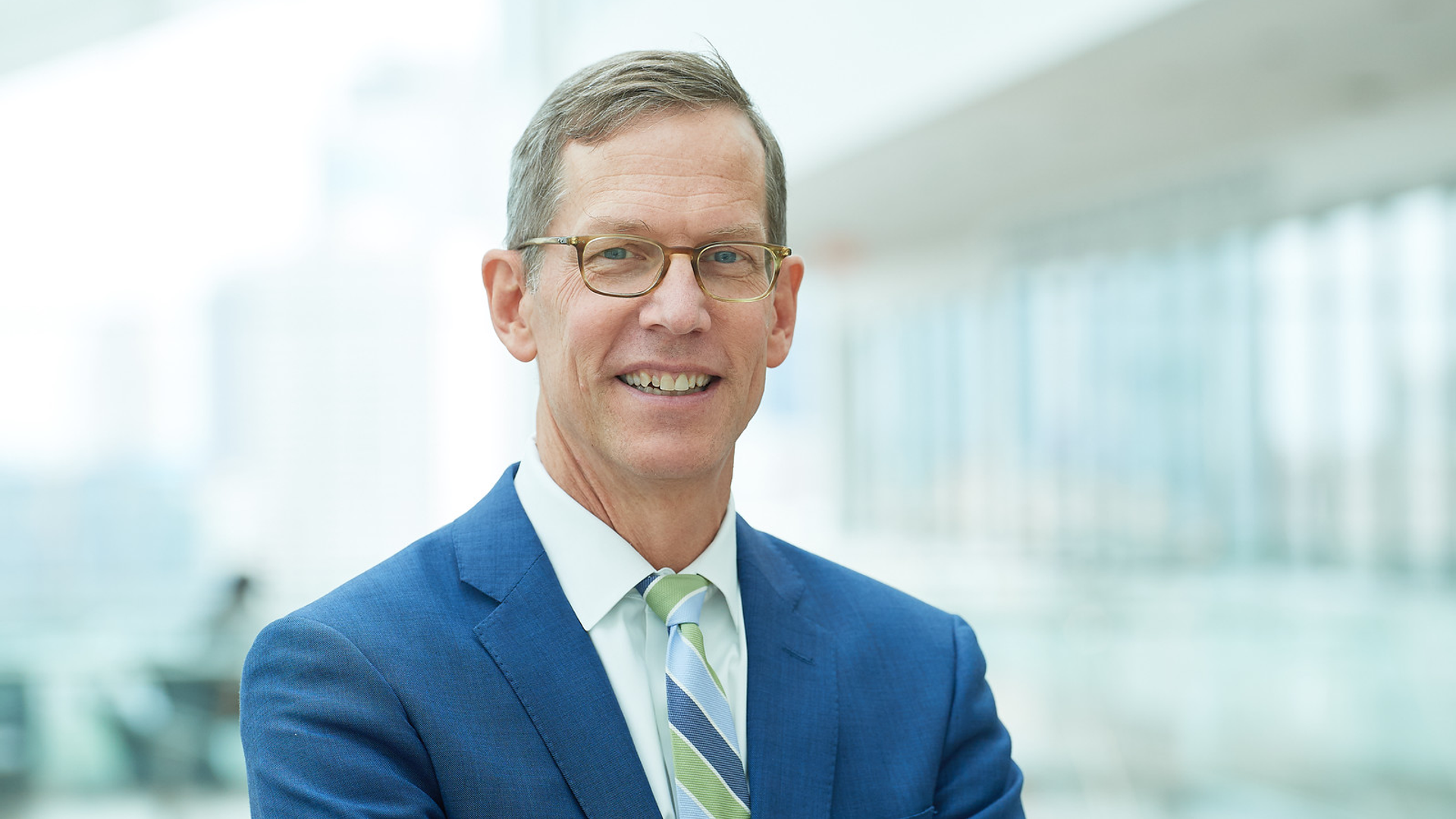 Robert H. Vonderheide smiling in business attire.