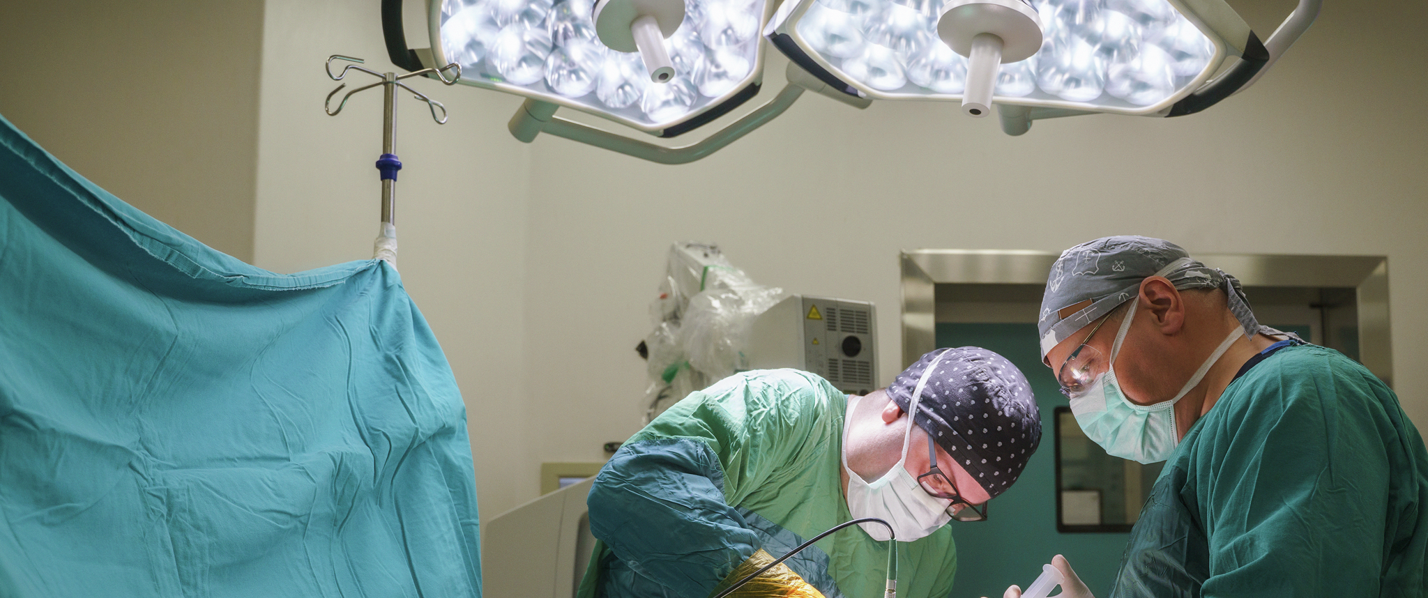 Neurosurgeons operate on brain tumor