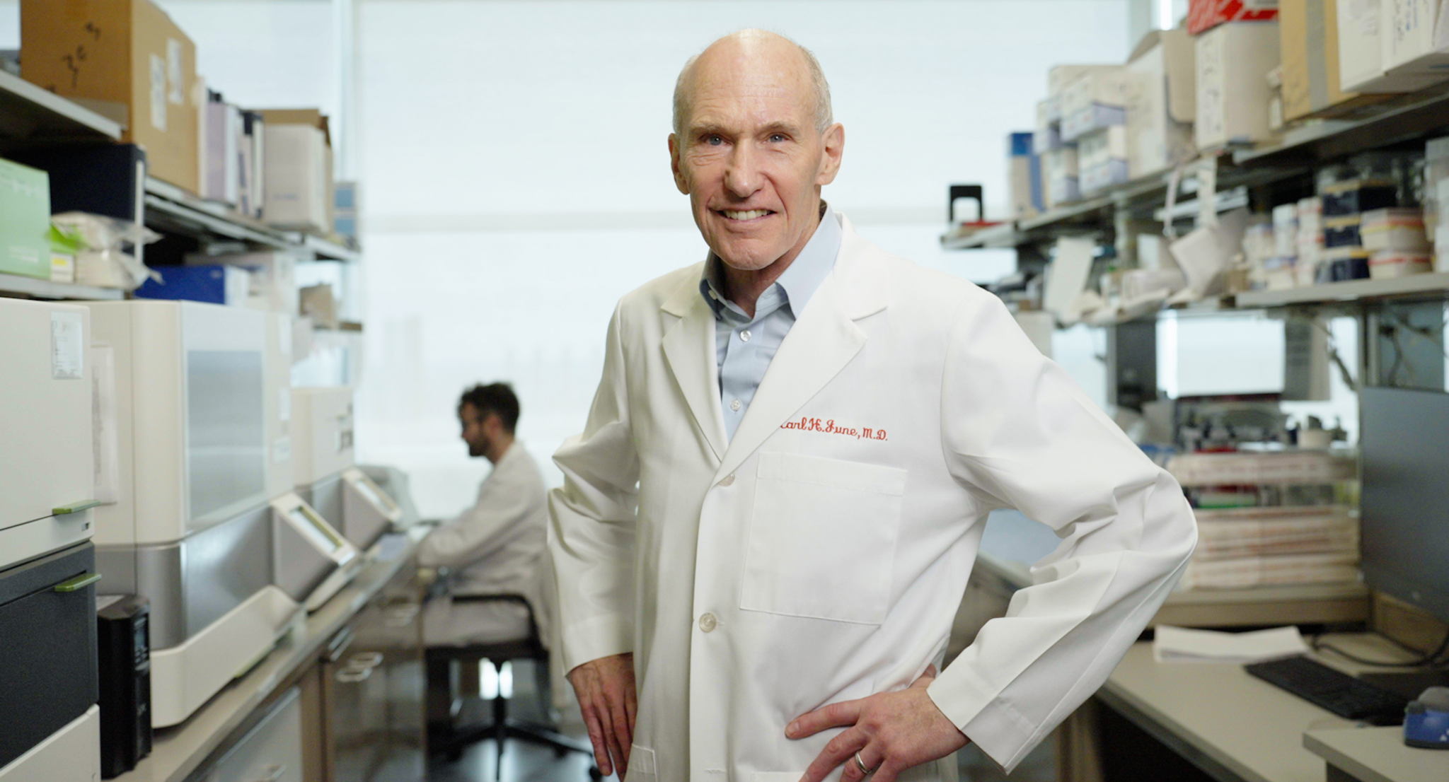 Carl June MD standing in lab