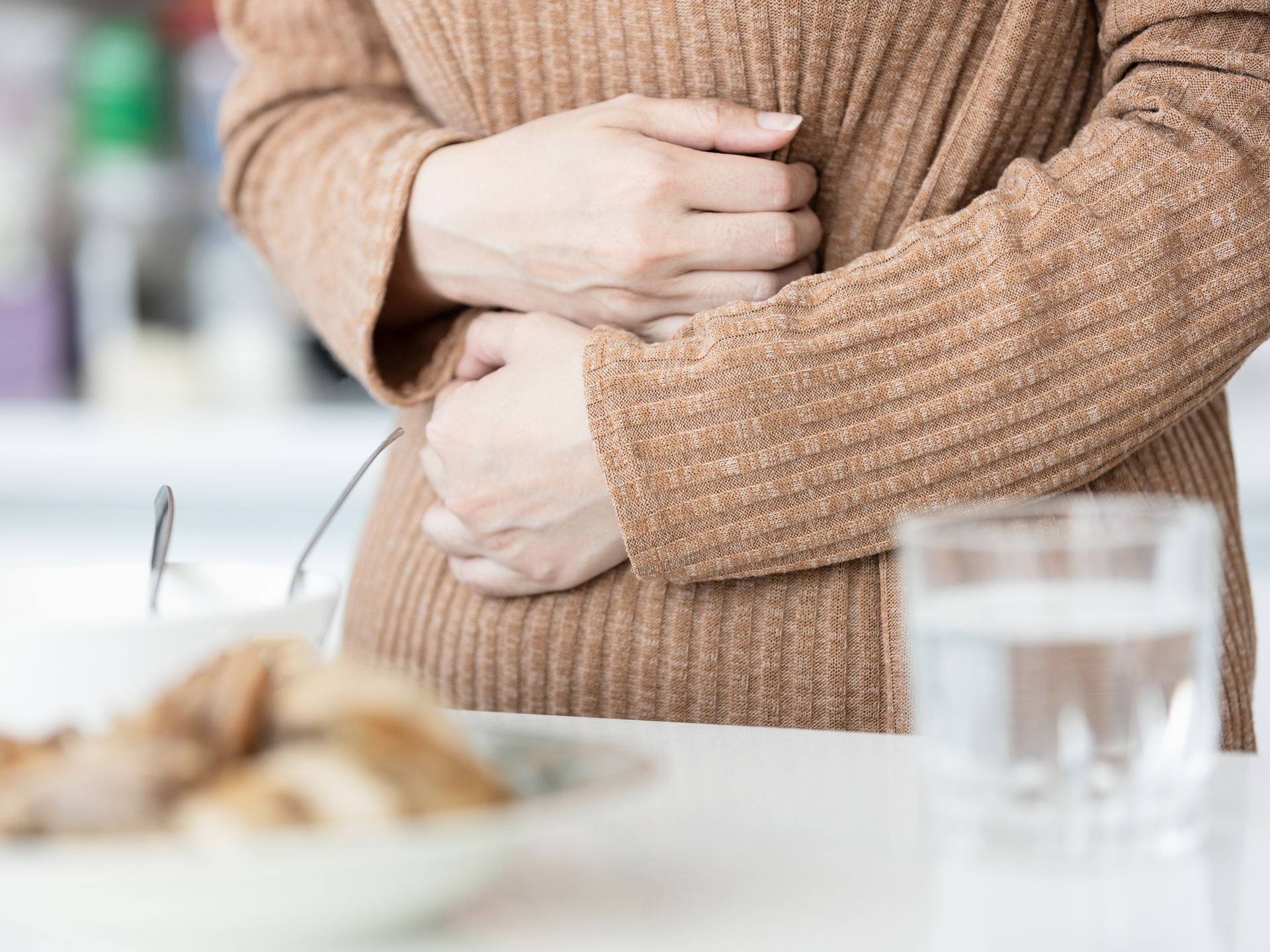 Sick woman has stomach ache,belly pain,painful in abdomen while eating,inflammation of stomach and intestines,gastrointestinal problems,