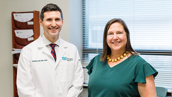 Knee replacement recipient Christy Hofmanner with her orthopaedic surgeon, Andrew Old, MD