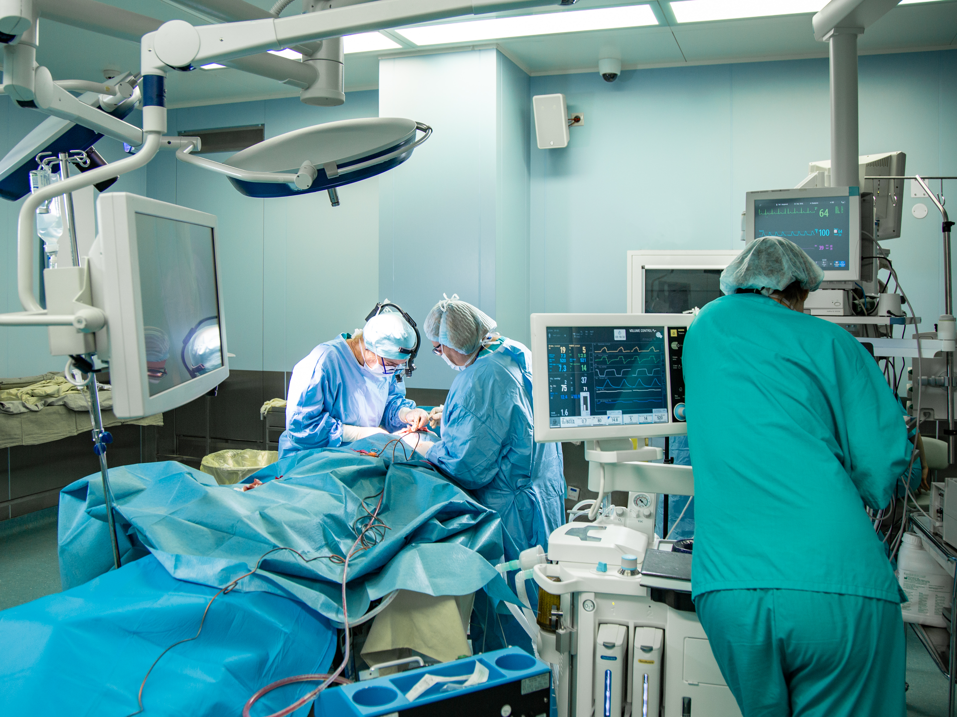Operating room, surgeons perform an operation, a team of professional surgeons working in the operating room with modern equipment