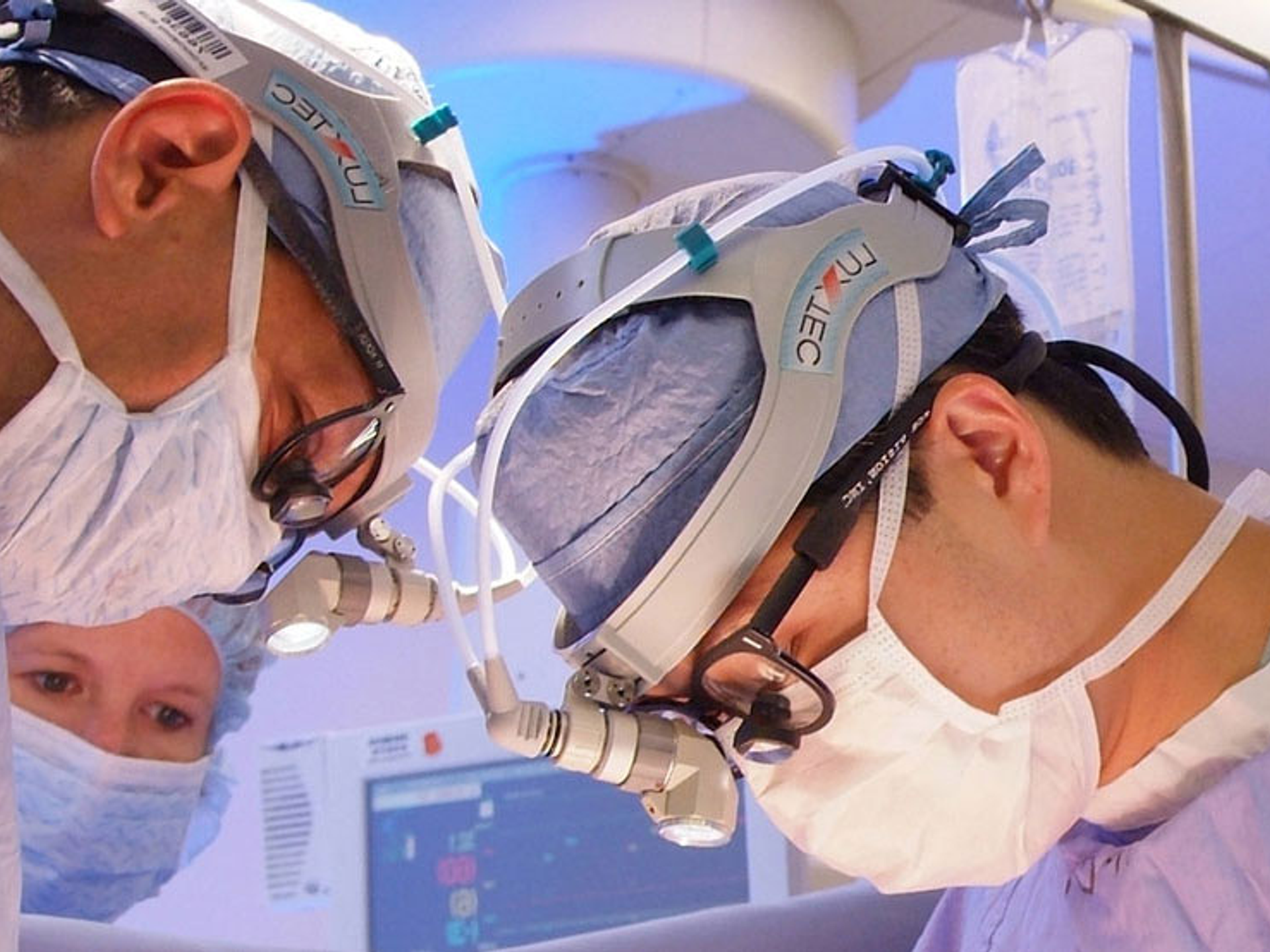 Doctors Szeto and Acker in surgery