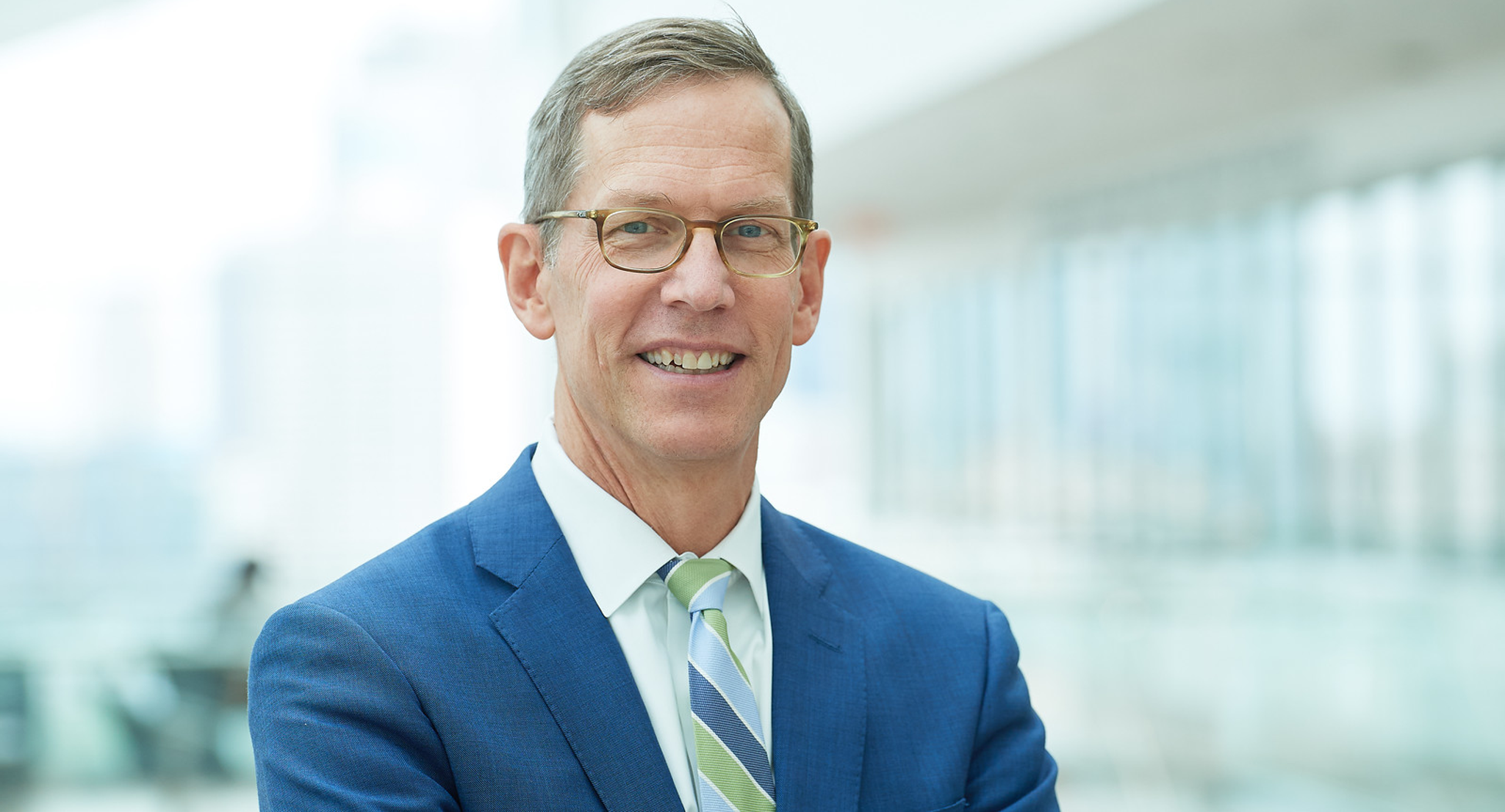 Robert H. Vonderheide smiling in business attire.