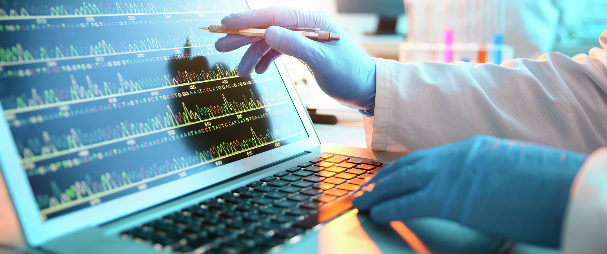 A scientist looking at a DNA sequence