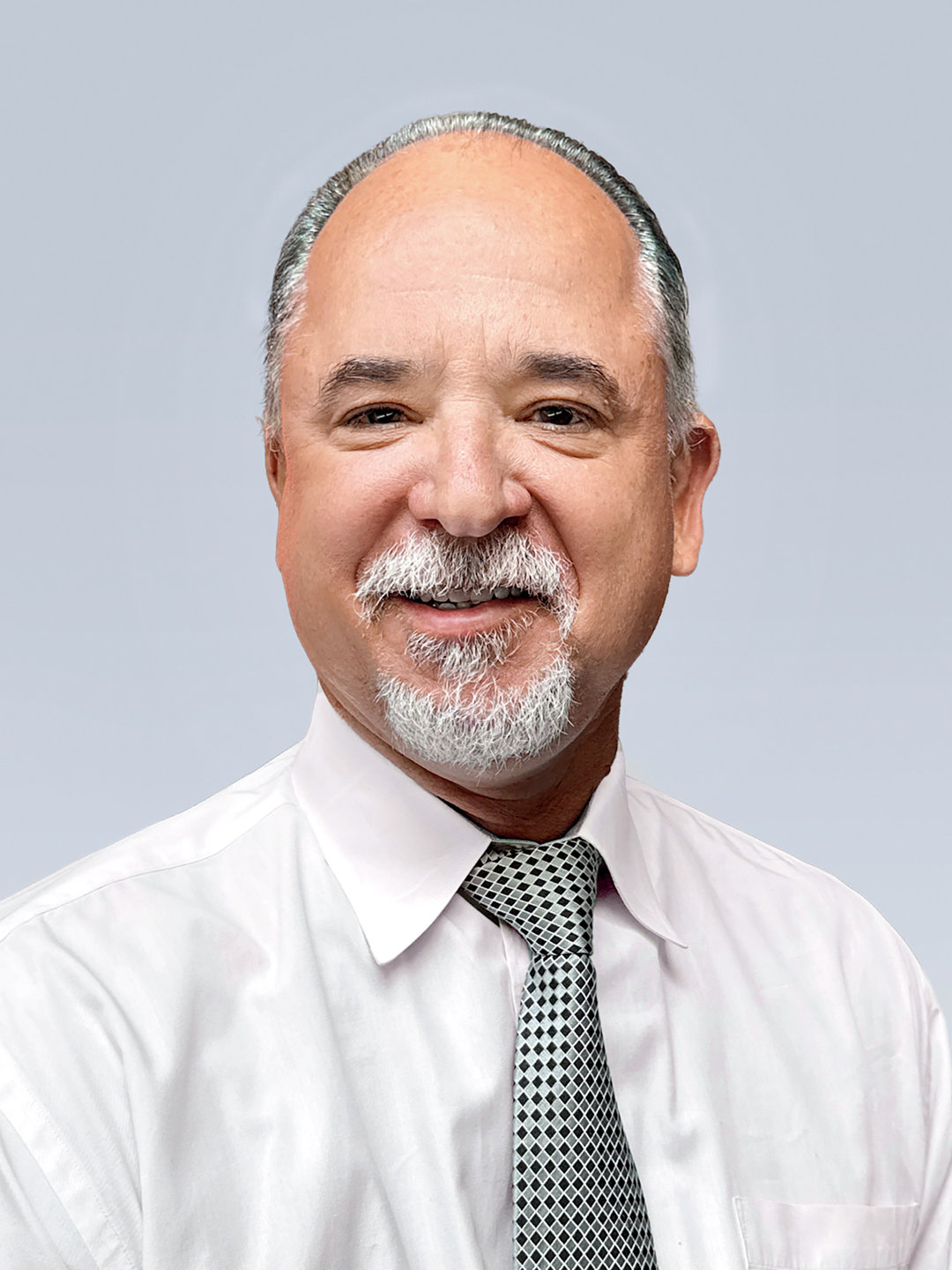 Headshot of David A. Travis, DO