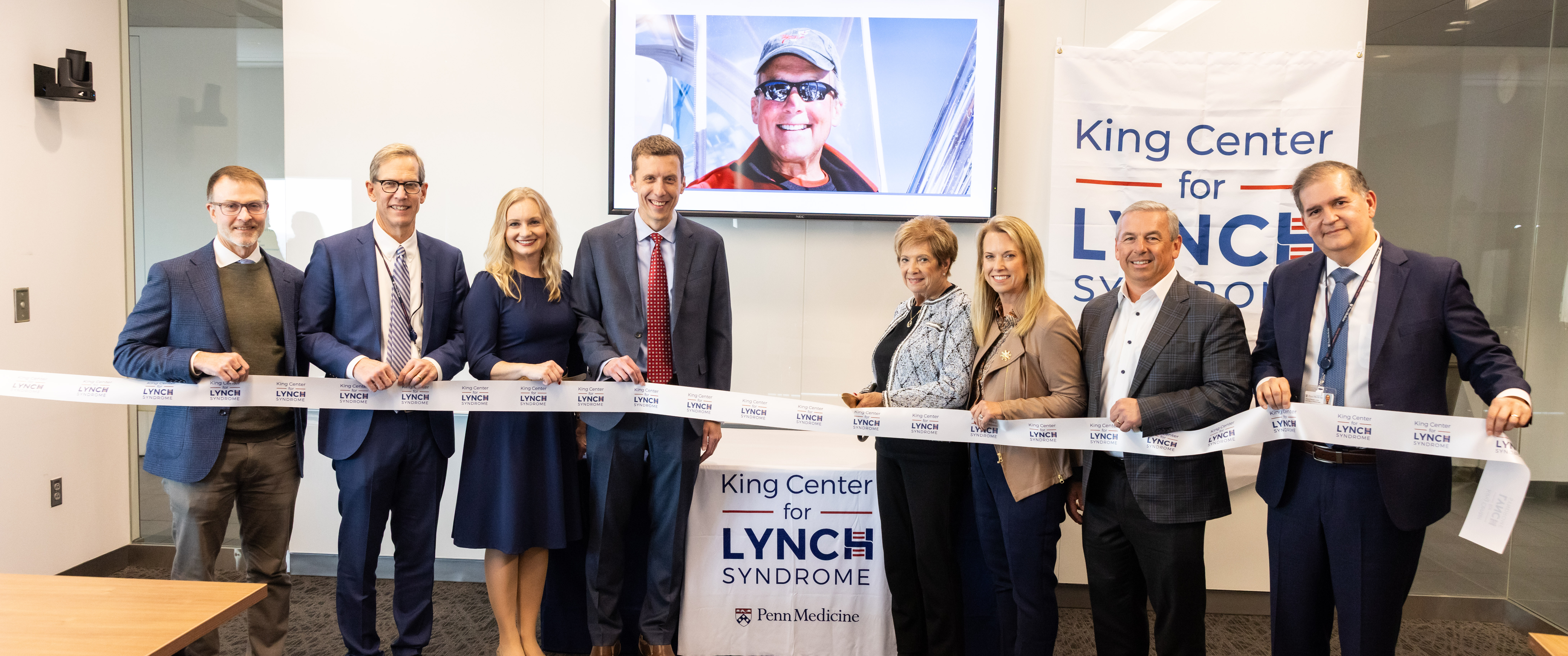 A ribbon-cutting ceremony of the King Center for Lynch Syndrome, attended by the center’s leadership team and members of the King and Borrelli families