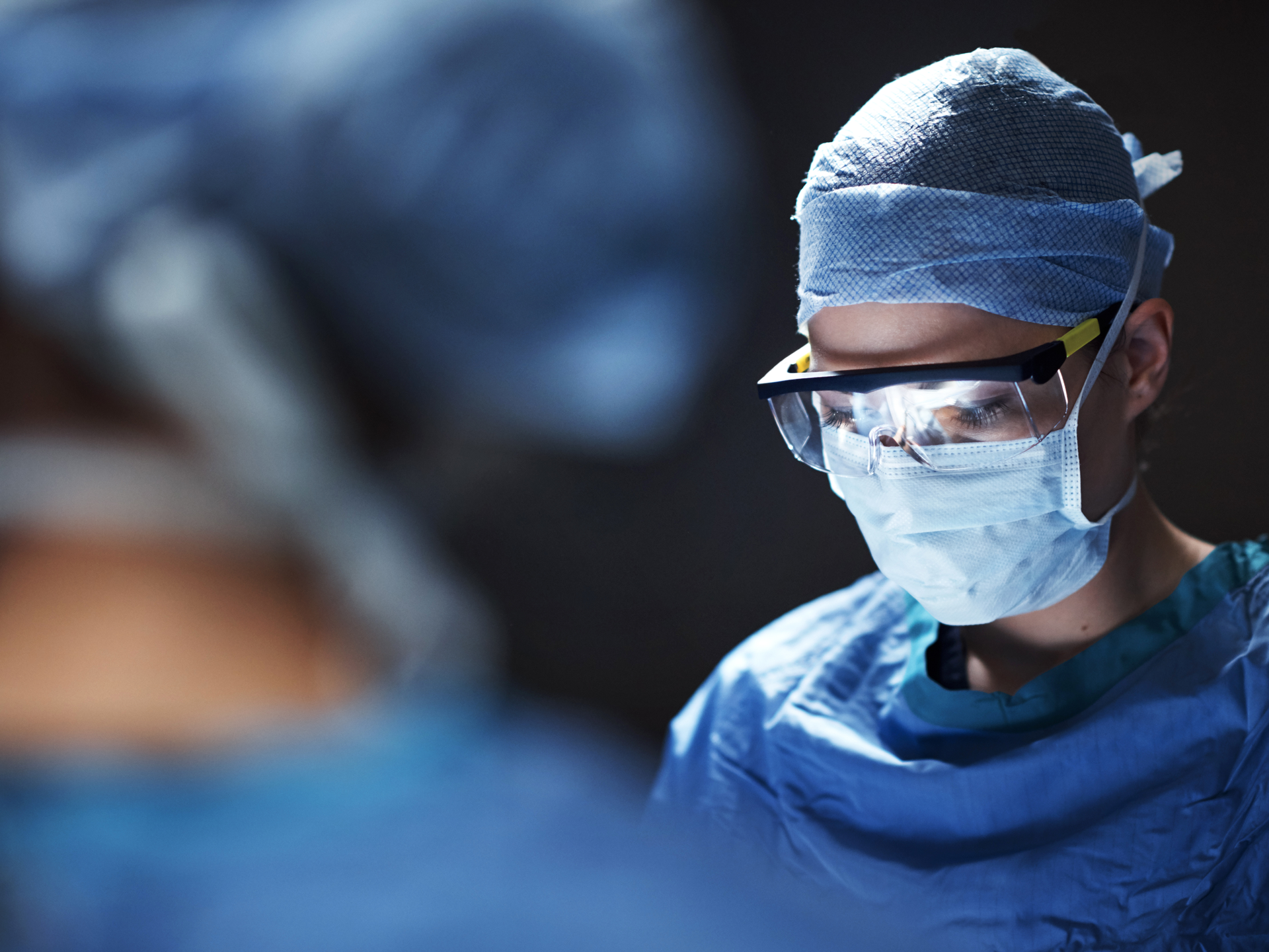 Cropped shot of surgeons performing a surgical procedure