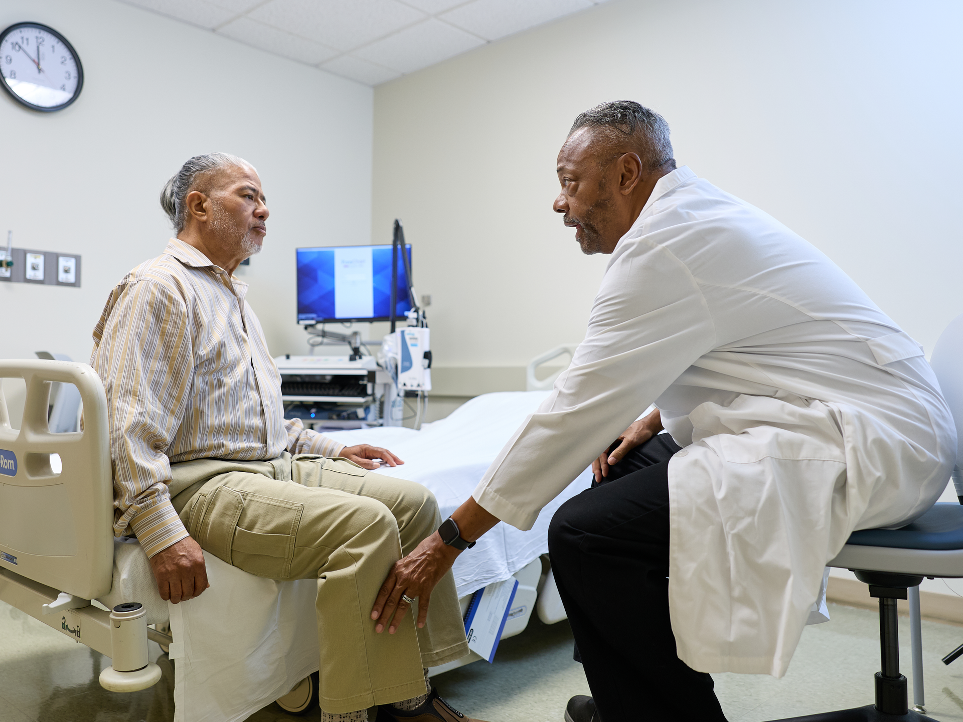 Doctor appointment with patient in an exam room at Penn,