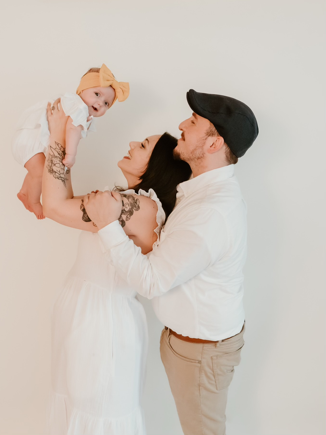 Eric Ezzi with his wife, Nicole, and their baby daughter